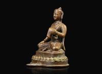 A small Himalayan (possibly Nepalese) figure of a seated attendant or donor 喜馬拉雅或尼泊爾坐像一尊
