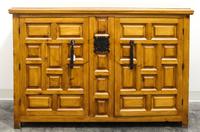 A Mexican Pine Cabinet Height 35 x width 52 x depth 19 inches.