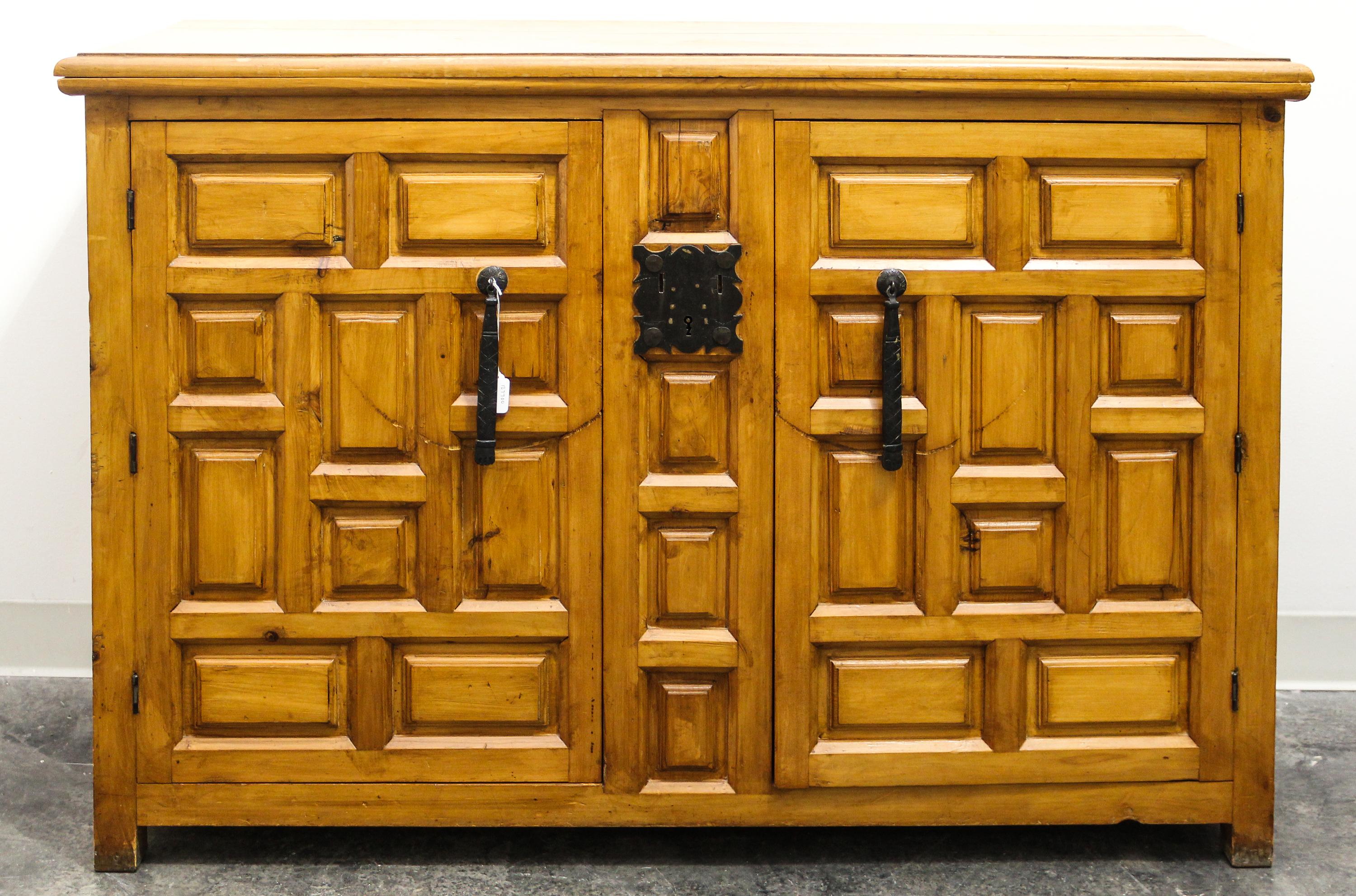 A Mexican Pine Cabinet Height 35 x width 52 x depth 19 inches.