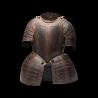 A 17th Century German Etched and Painted Half Suit of Armor