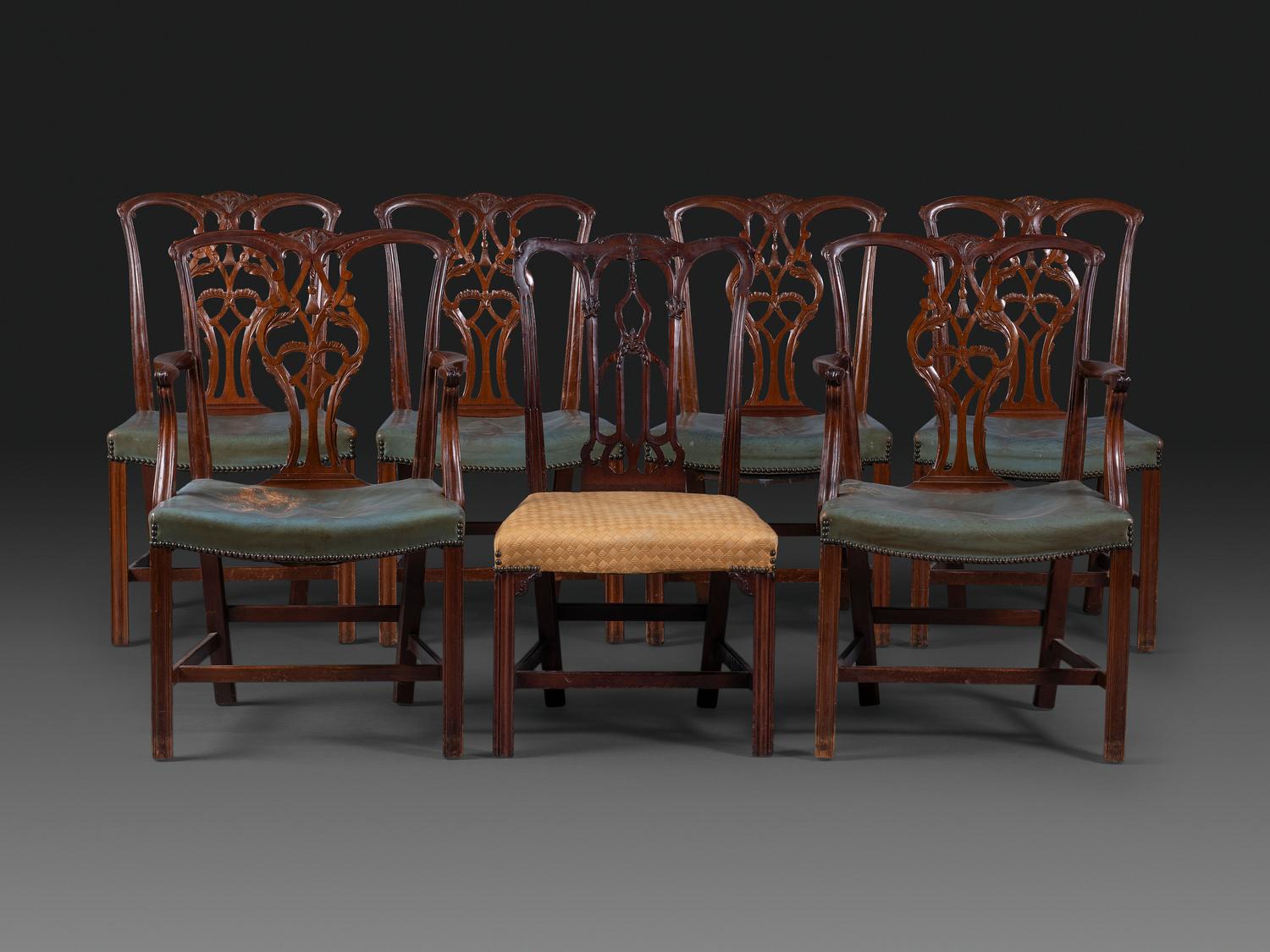 A Set of Six Chippendale Style Carved Mahogany Dining Chairs