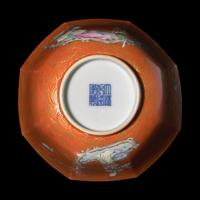 A Chinese Coral-Ground Famille Rose Octagonal Bowl, 20th Century — 近代 珊瑚紅地描金粉彩仙人乘槎圖八方碗