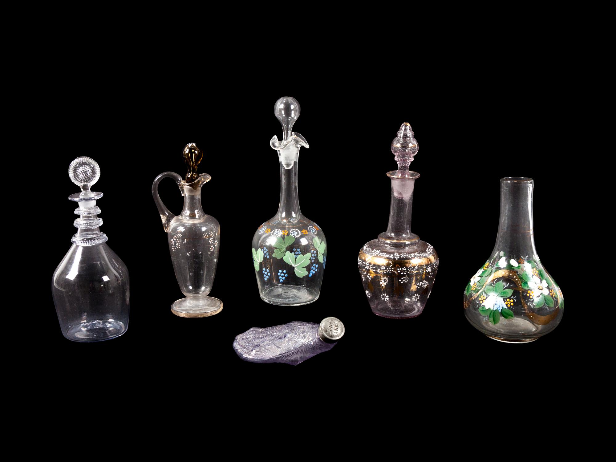 A Large Collection of Blown Glass Decanters, Pitchers, Vases and Cups