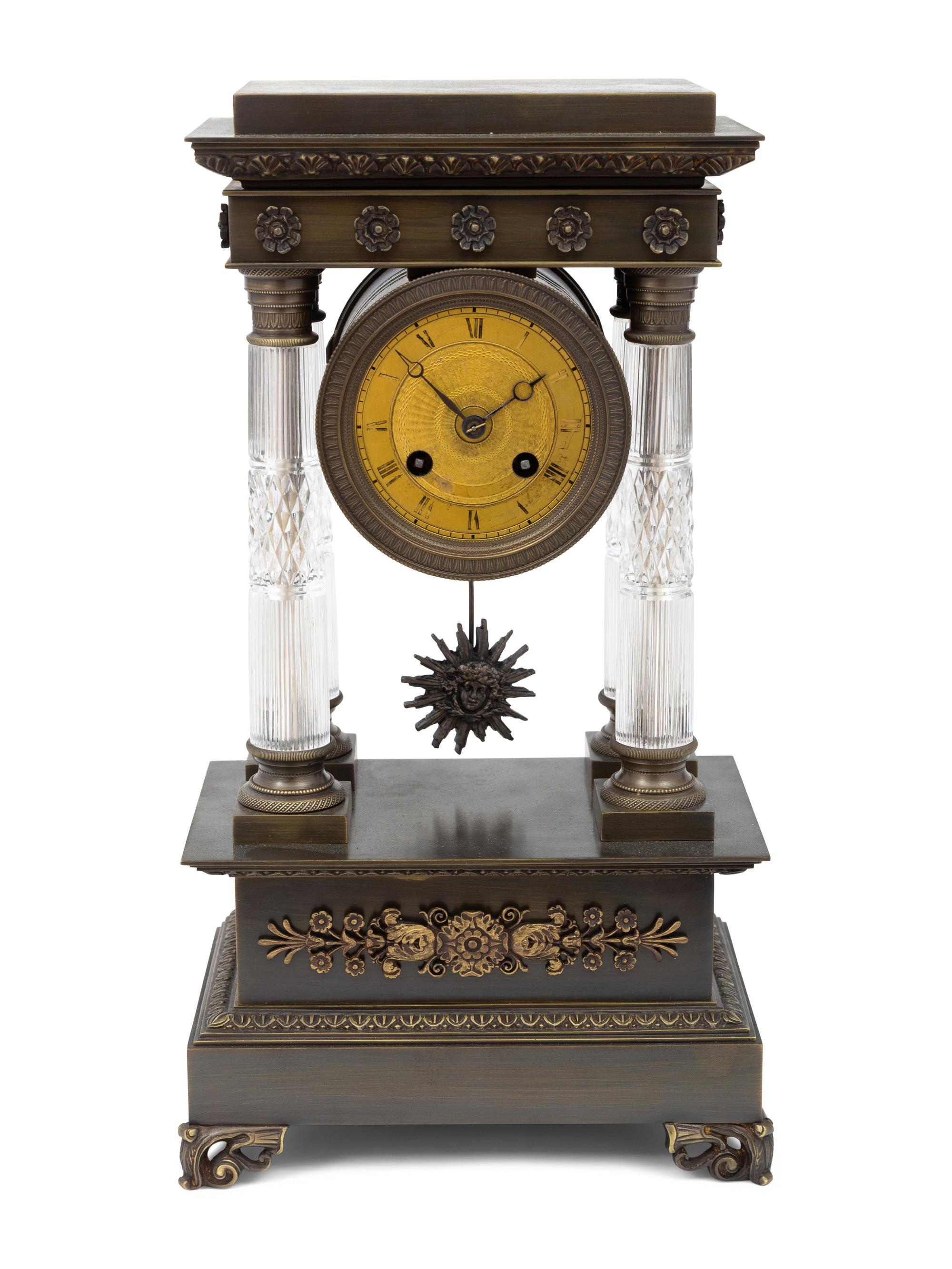An Empire Style Bronze and Cut Glass Mantel Clock