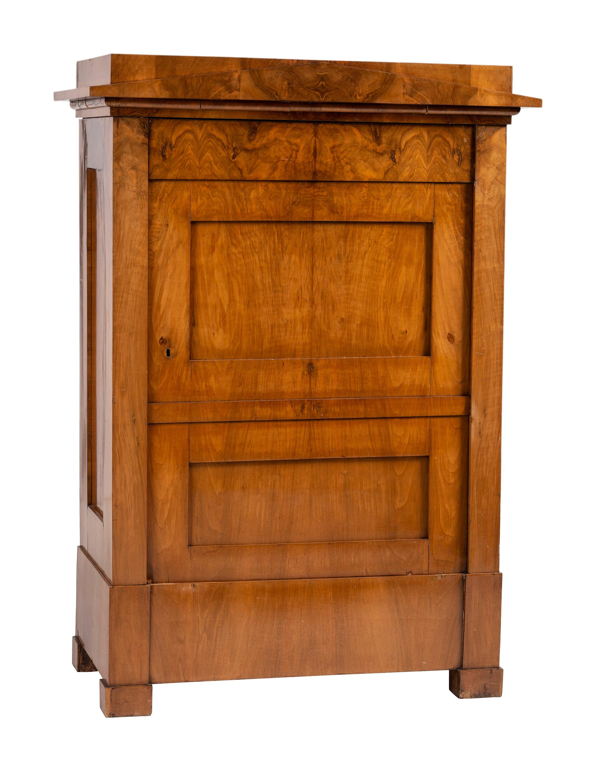 A Biedermeier Figured Birch Cabinet