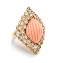 An 18 Karat Yellow Gold, Angel Skin Coral, and Diamond Ring, Andre Vassort for Boucheron, 6.70 dwts.
