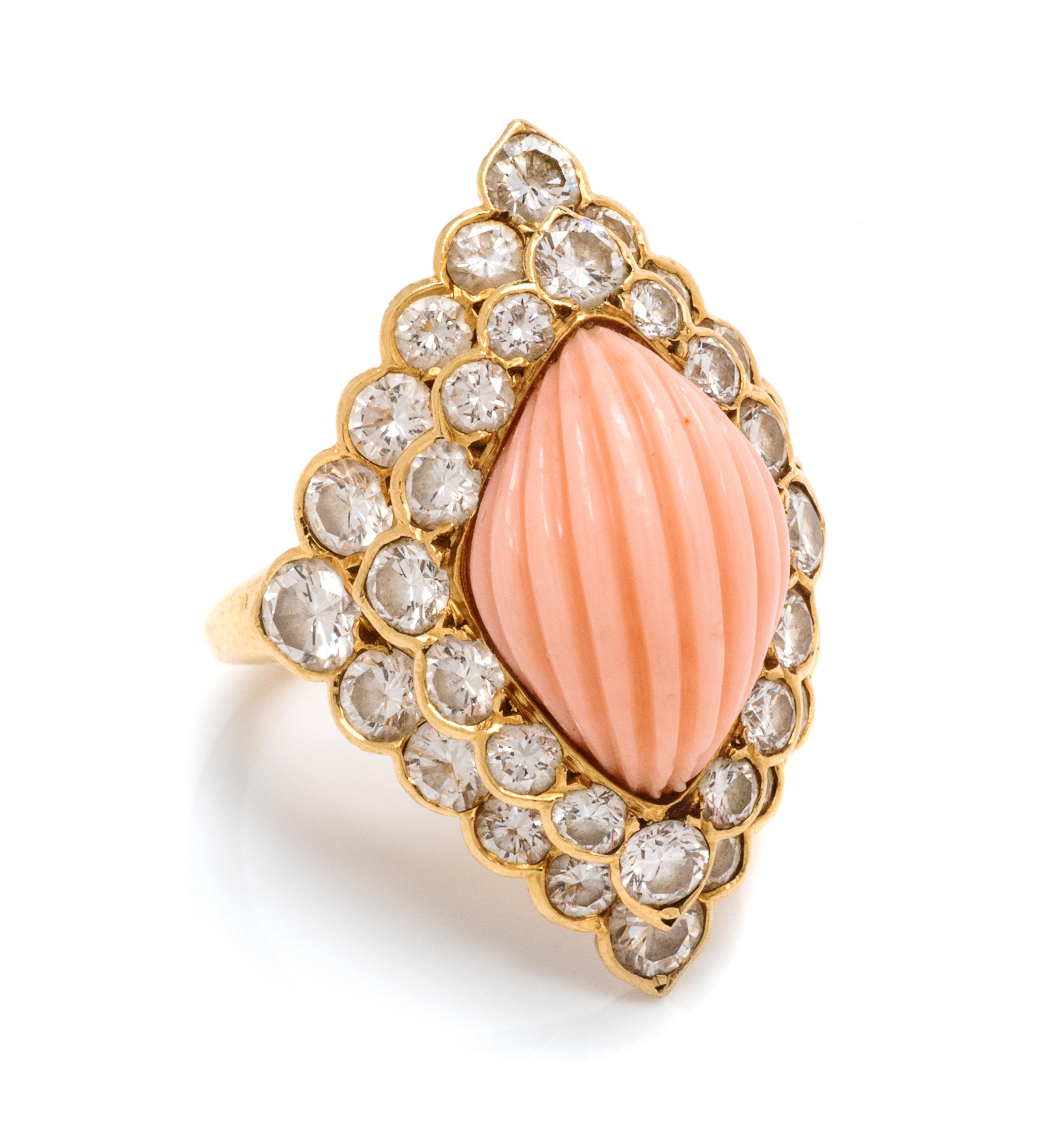 An 18 Karat Yellow Gold, Angel Skin Coral, and Diamond Ring, Andre Vassort for Boucheron, 6.70 dwts.