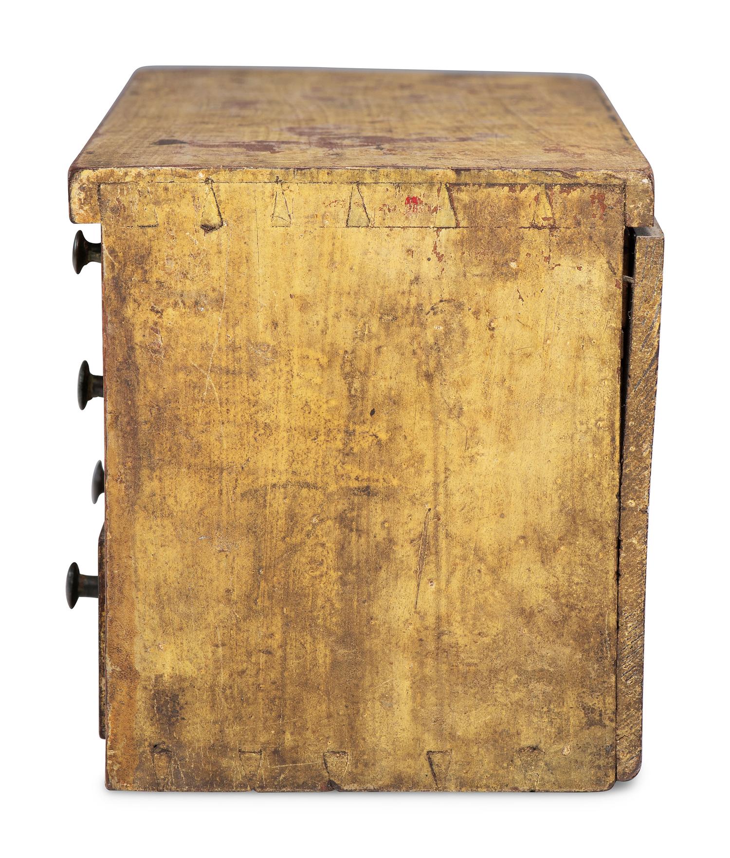 A Southern Yellow Painted Cherrywood and Yellow Pine Miniature Chest