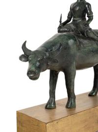 An Indian or Southeast Asian Bronze Model of a Figure on a Water Buffalo