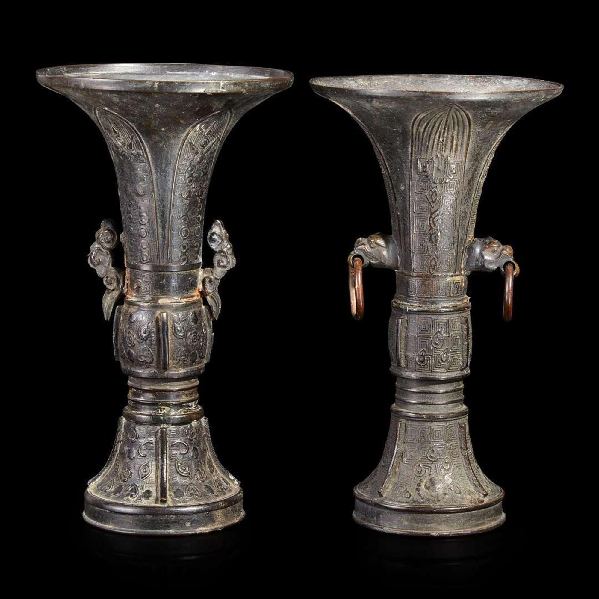 Two patinated bronze archaistic gu-form vases 18th/19th century or earlier