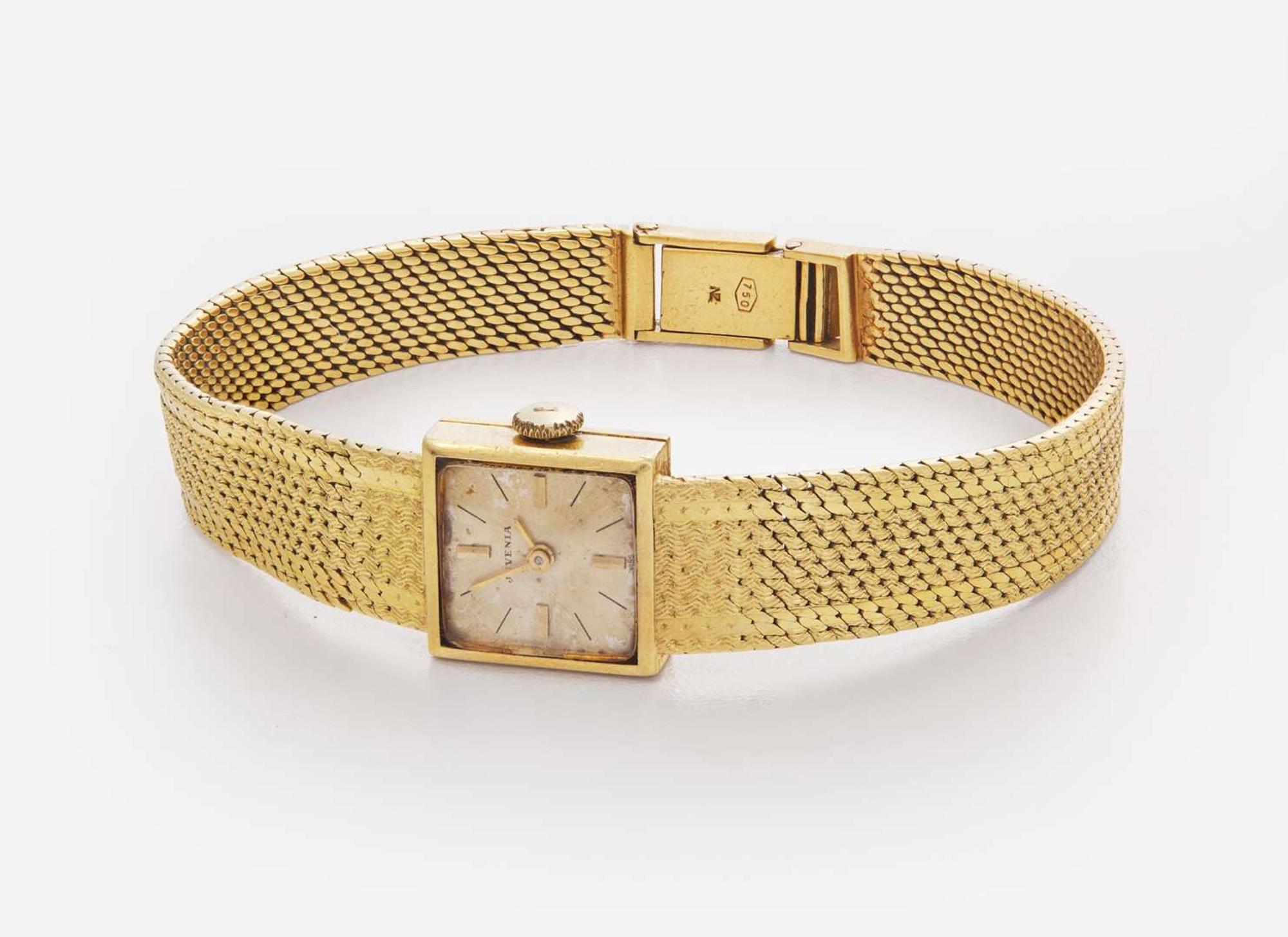 An 18K Yellow Gold Ladies Juvenia Bracelet Watch