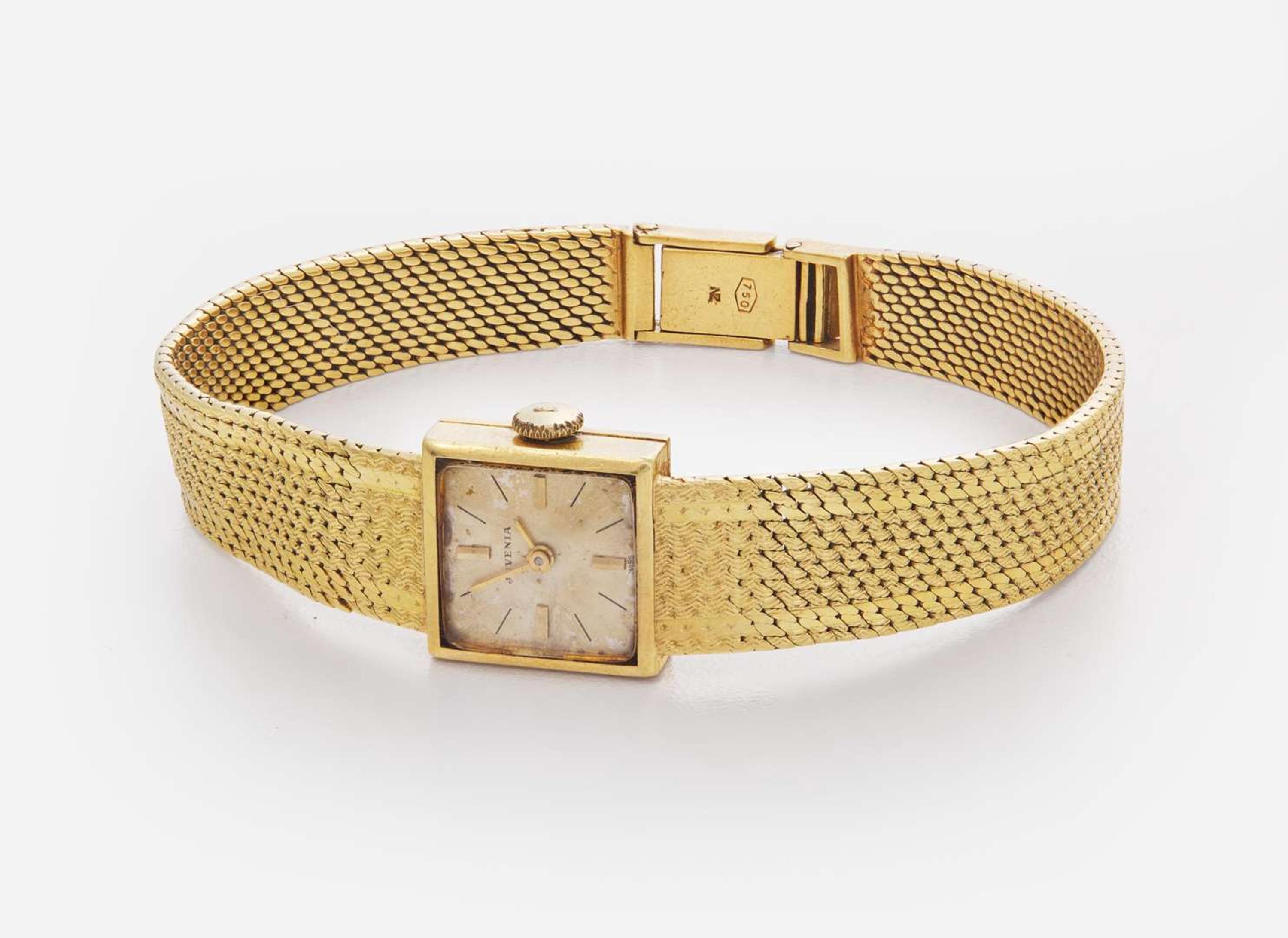 An 18K Yellow Gold Ladies Juvenia Bracelet Watch