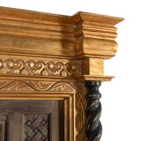 A Southeast Asian Giltwood and Carved Teak Mirror