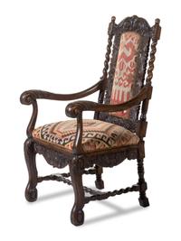 A Renaissance Revival Carved Oak Parlor Suite
