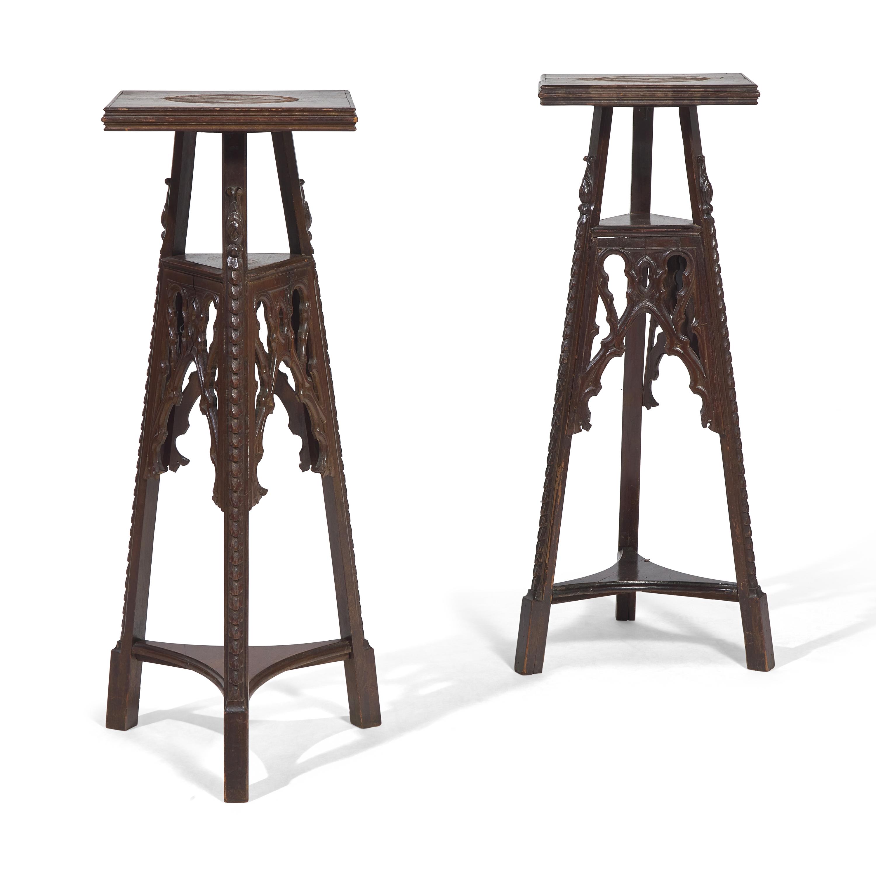 A Pair of Neogothic Carved Oak Jardiniere Stands