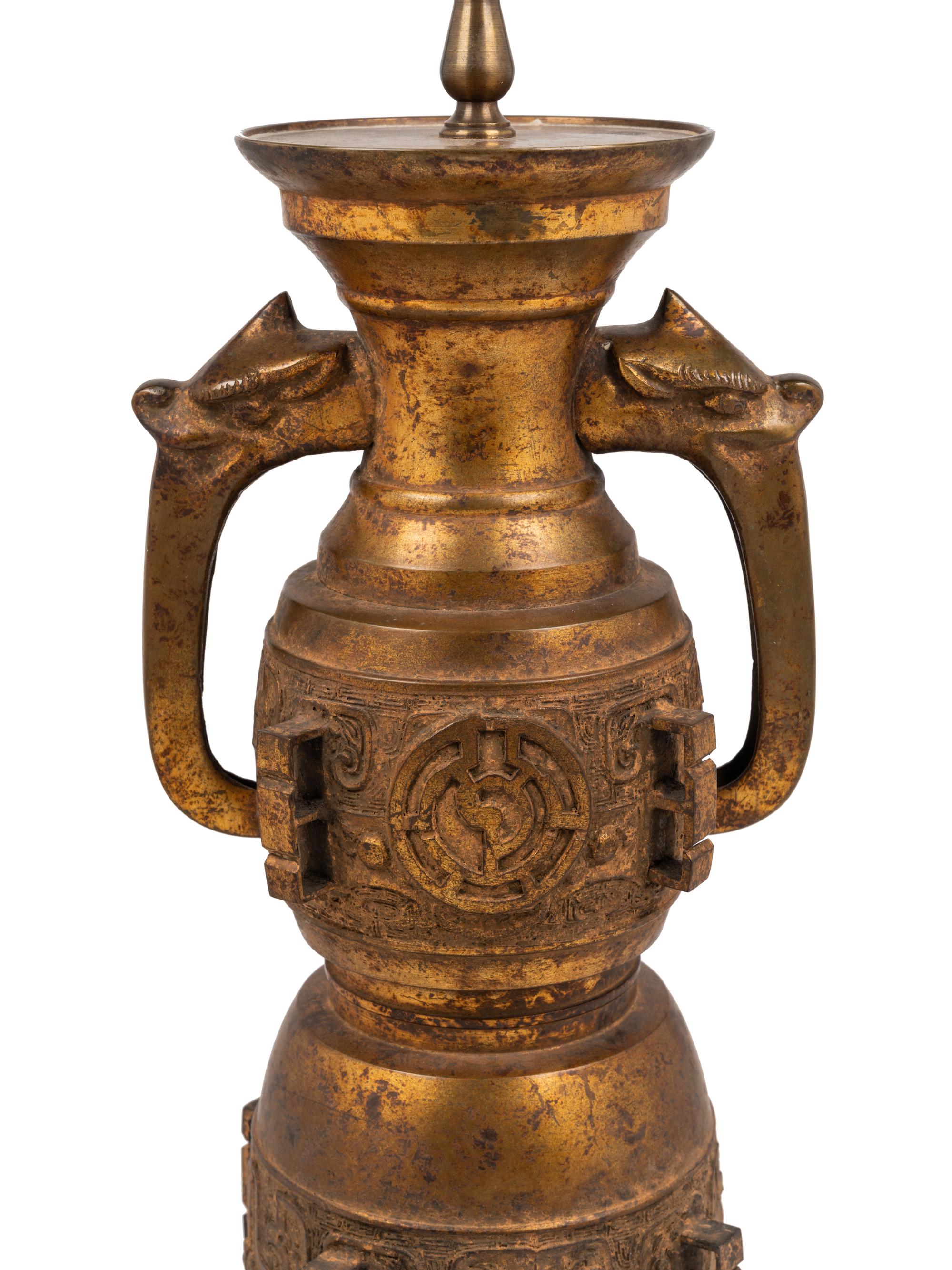 A Chinese Archaic Style Gilt Metal Lamp in the Manner of James Mont