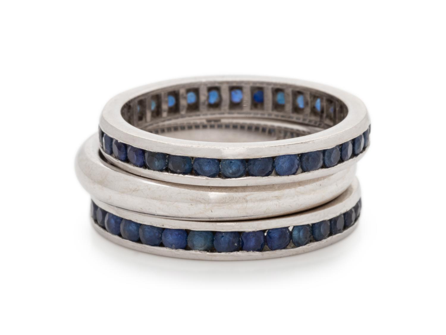 COLLECTION OF WHITE GOLD AND SAPPHIRE ETERNITY BANDS