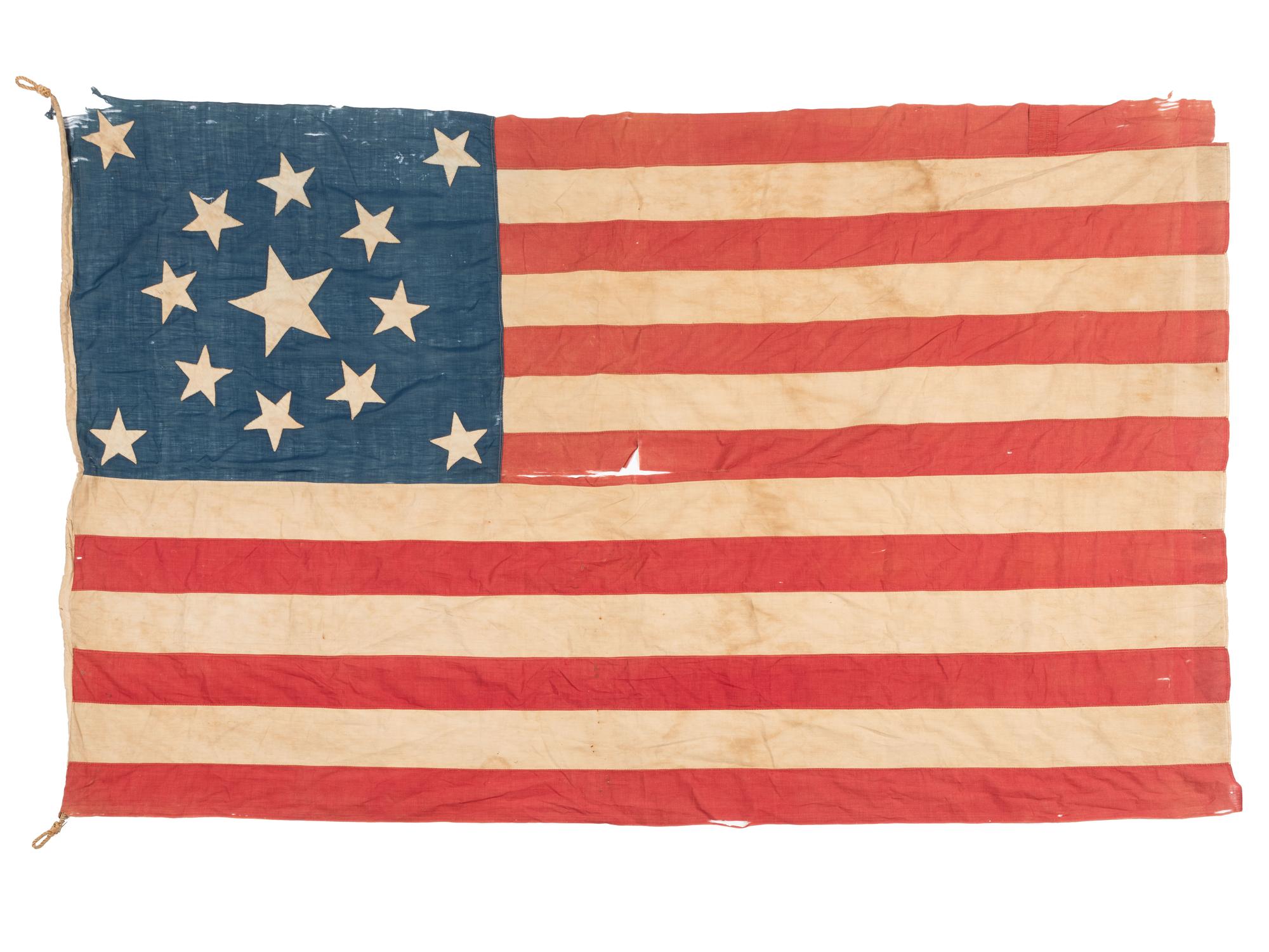 [FLAGS]. 13-star American flag with medallion pattern. Ca late 19th-early 20th century.