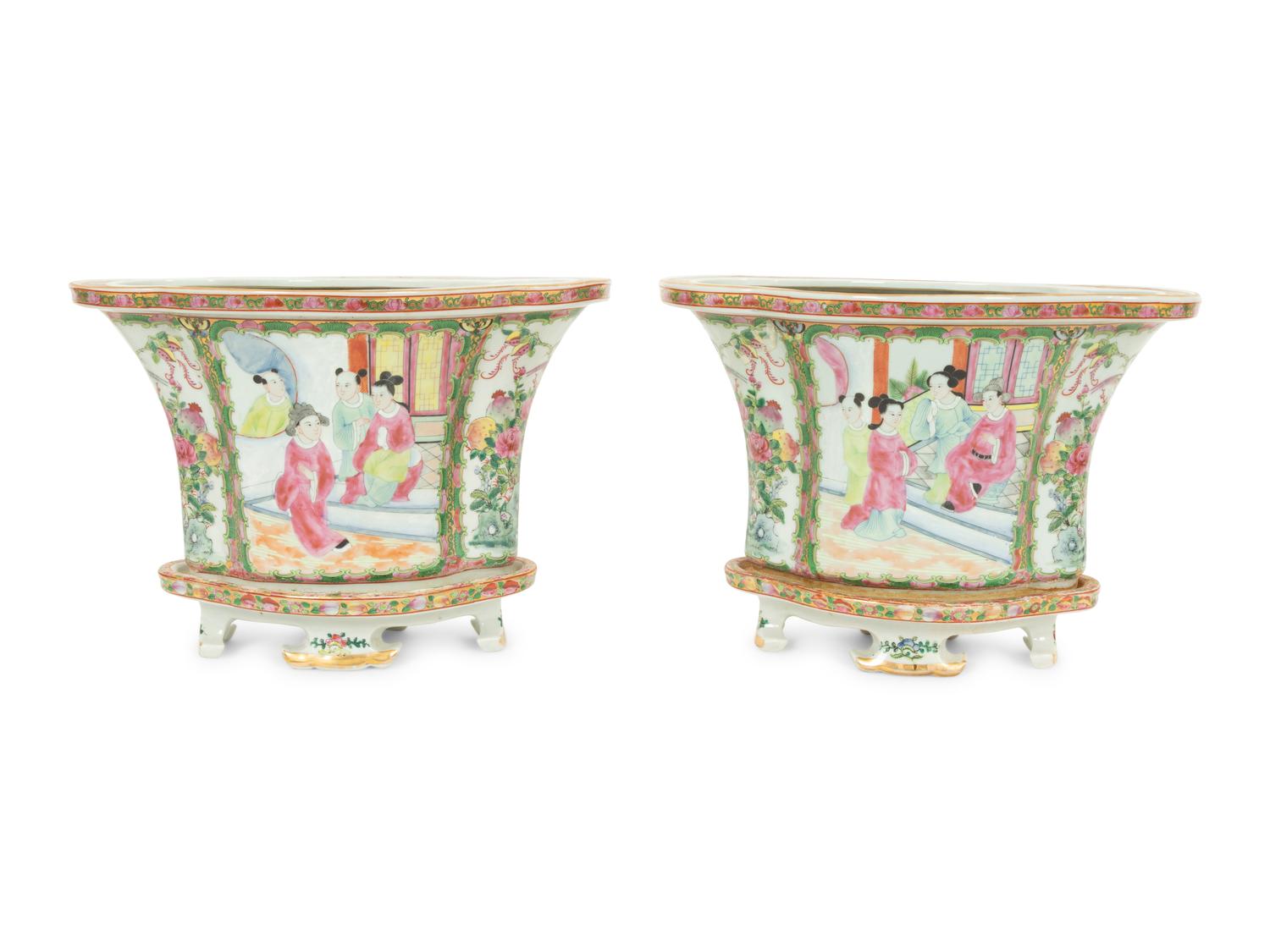A Pair of Rose Canton Porcelain Oval Jardinieres on Conforming Footed Bases