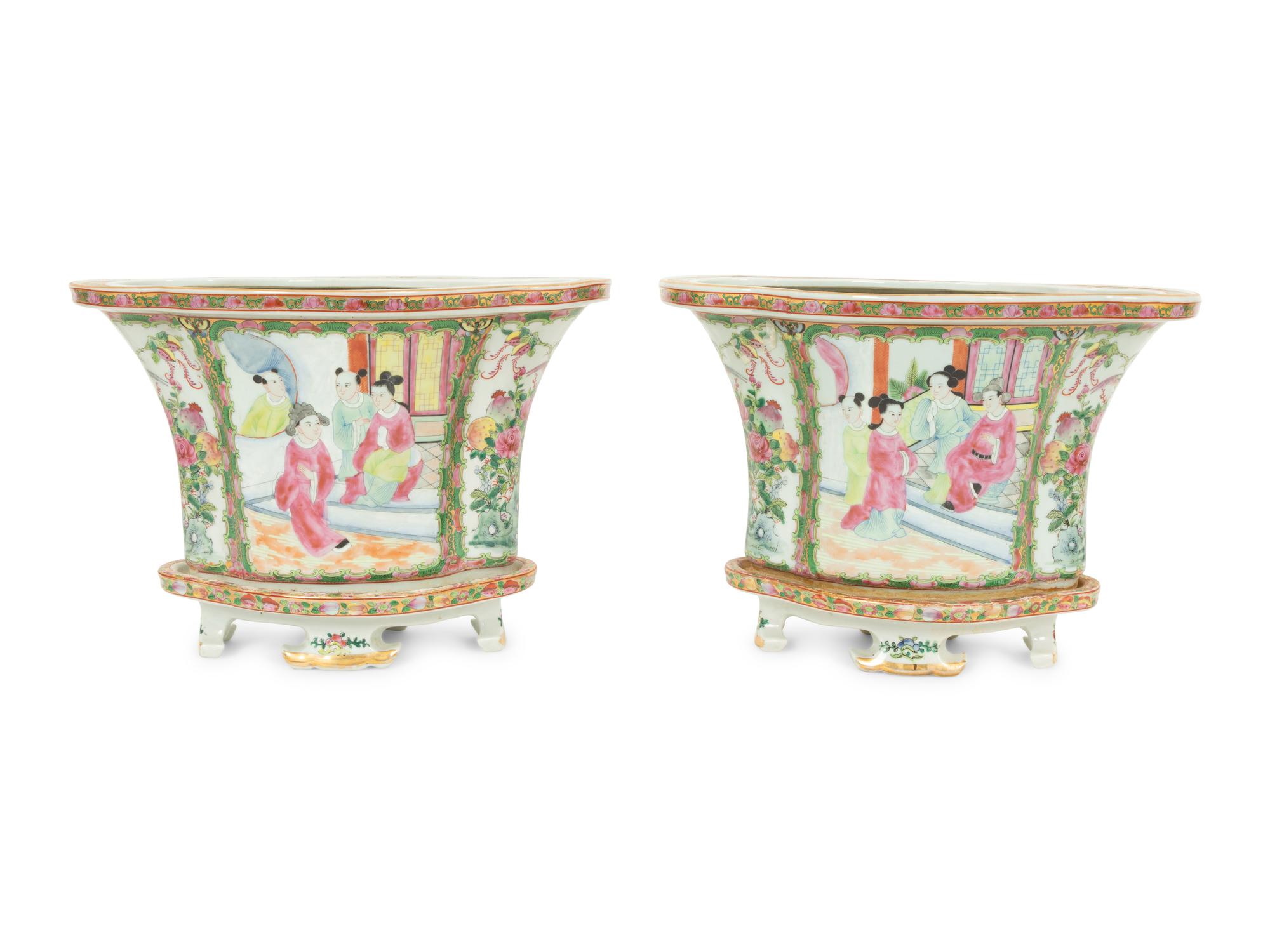 A Pair of Rose Canton Porcelain Oval Jardinieres on Conforming Footed Bases