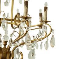 A Louis XV Style Gilt Metal and Cut Glass Six-Light Chandelier