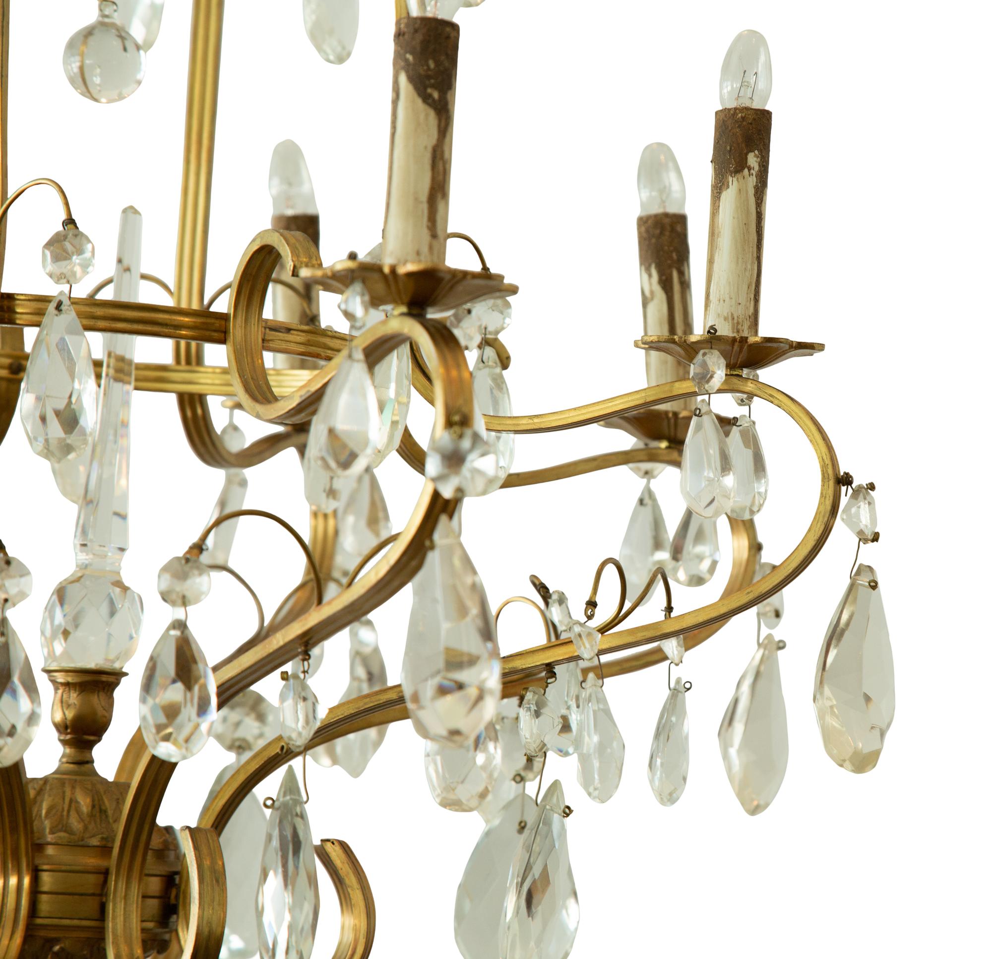 A Louis XV Style Gilt Metal and Cut Glass Six-Light Chandelier