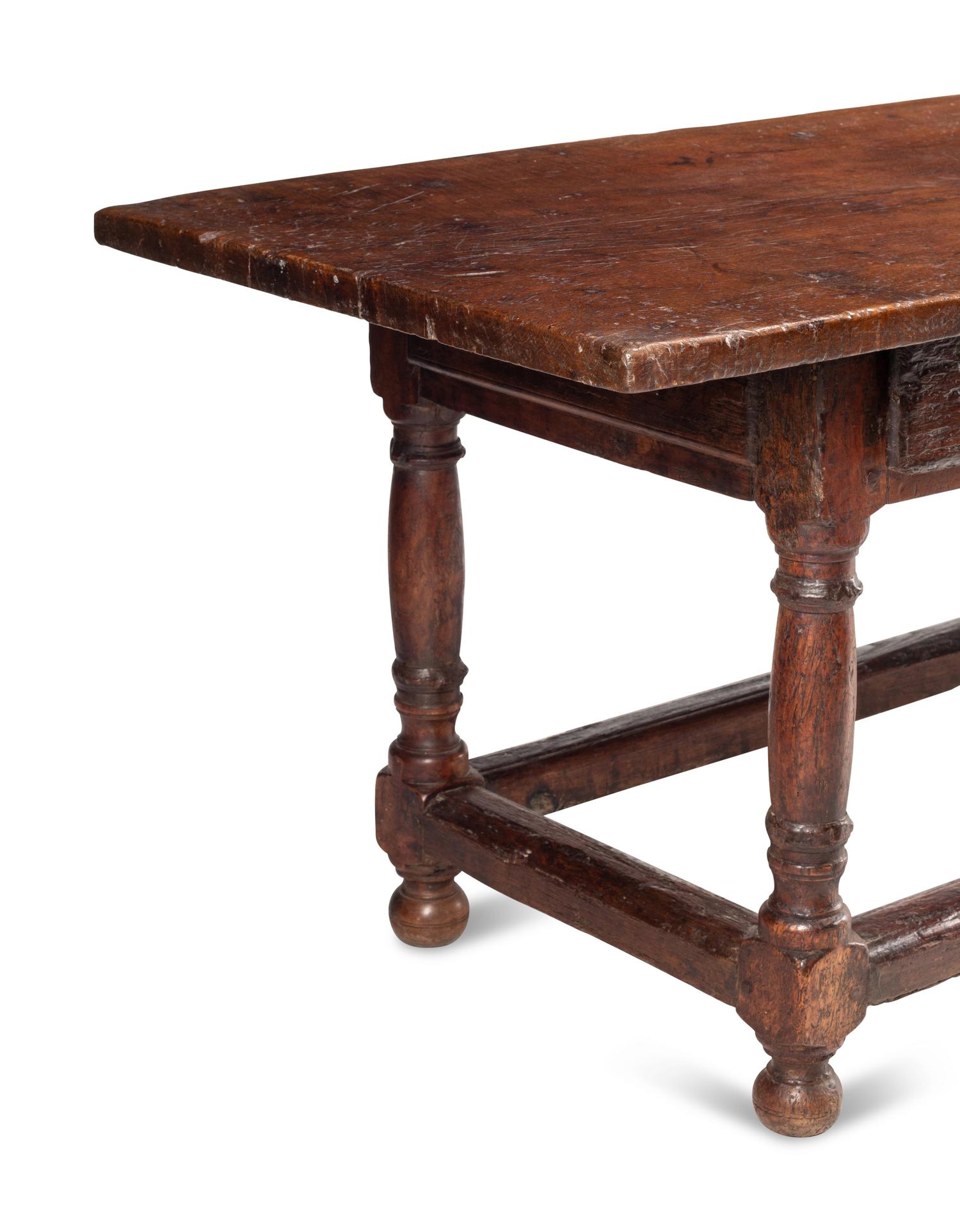 An Italian Baroque Walnut Table