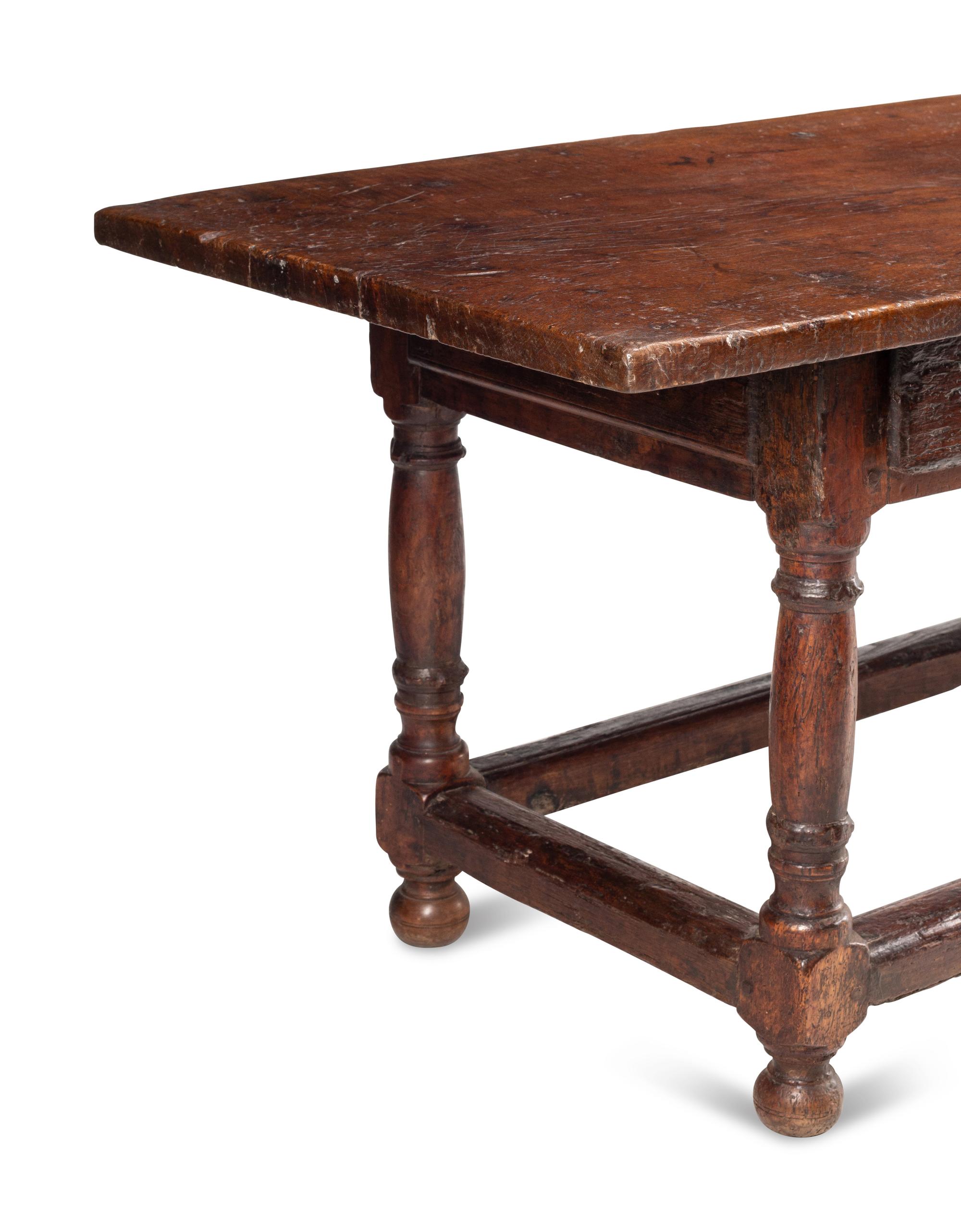An Italian Baroque Walnut Table