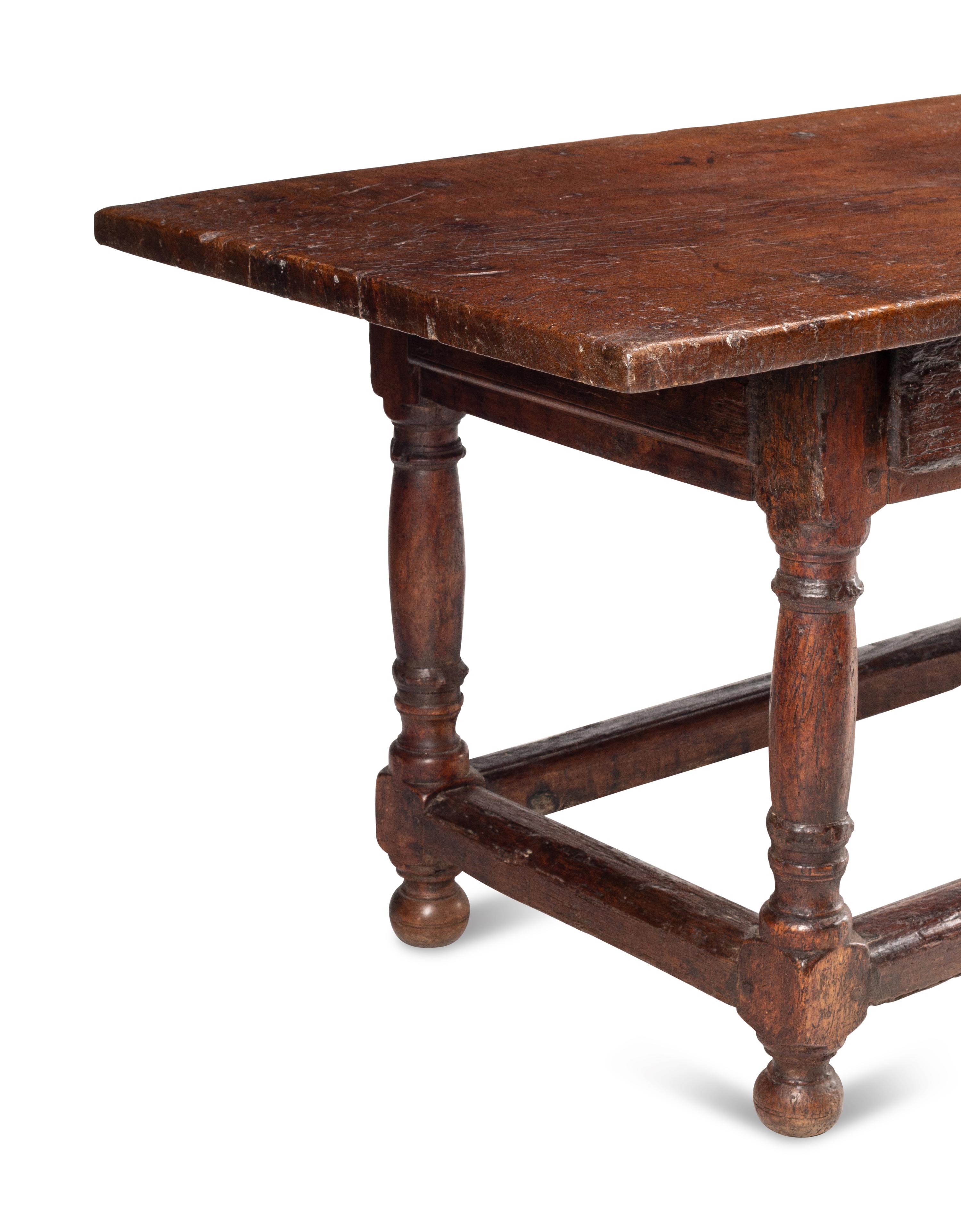 An Italian Baroque Walnut Table
