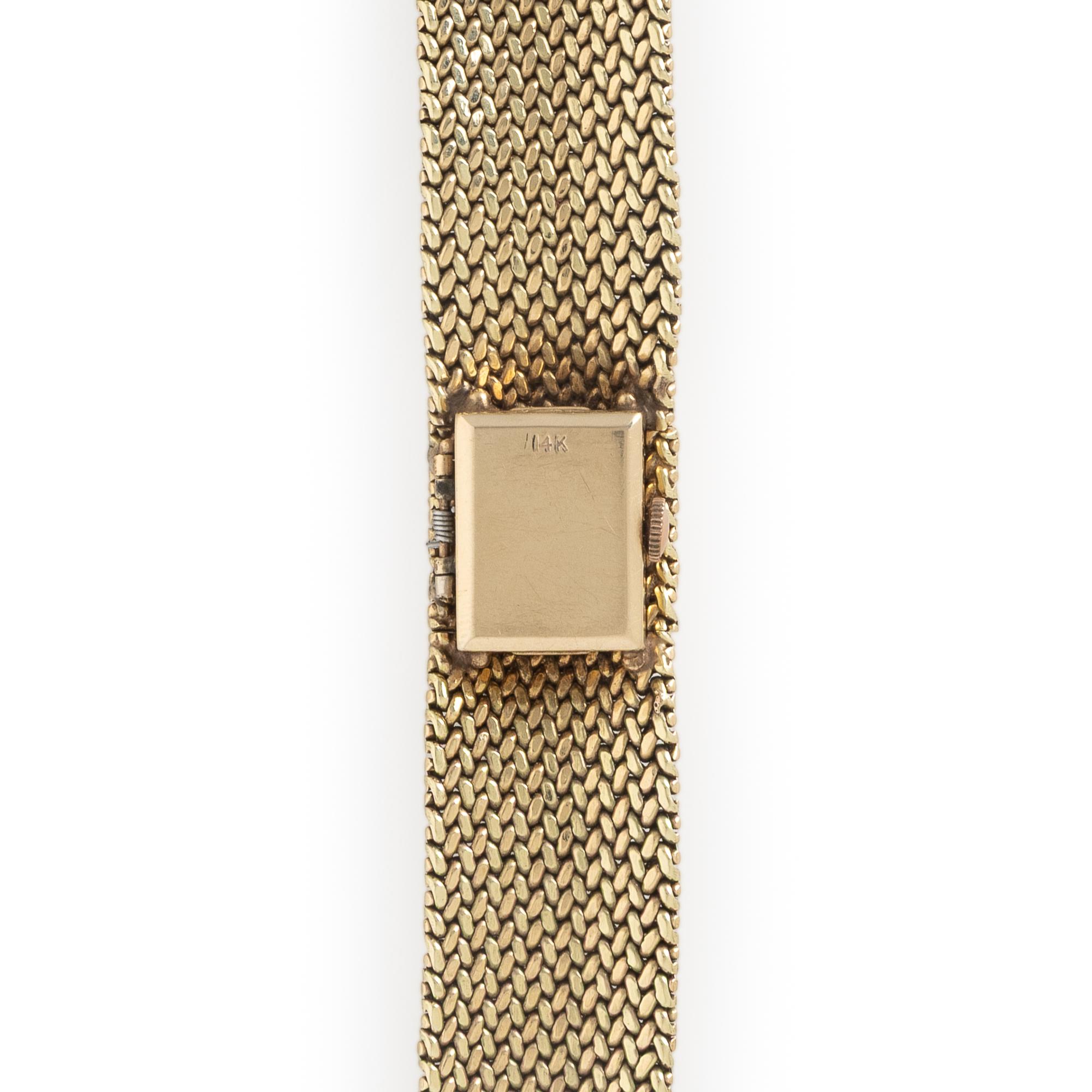 Hebe, 14K Yellow Gold Surprise Watch
