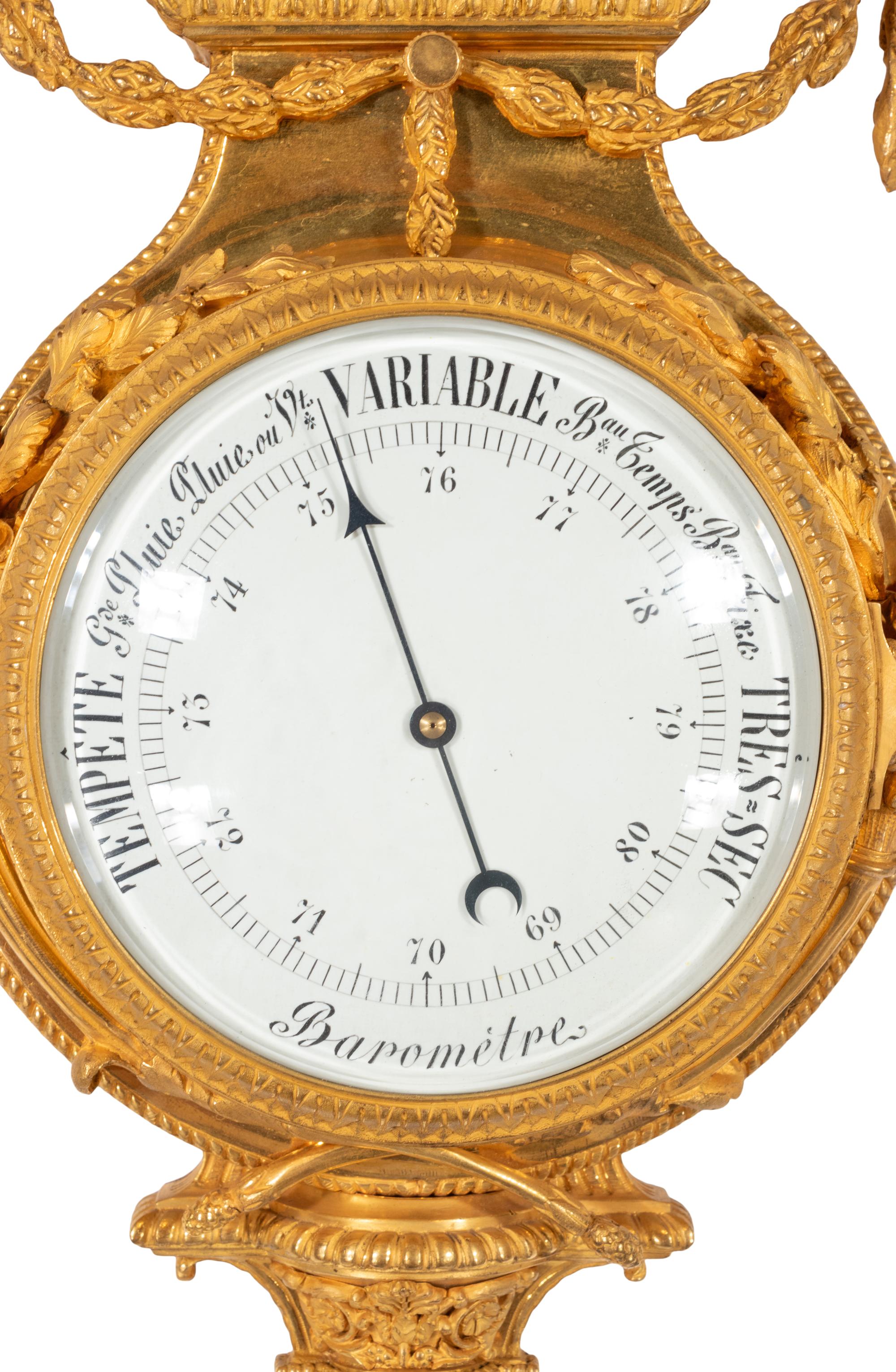 A French Neoclassical Gilt Bronze and Jasperware Cartel Clock and Barometer Set