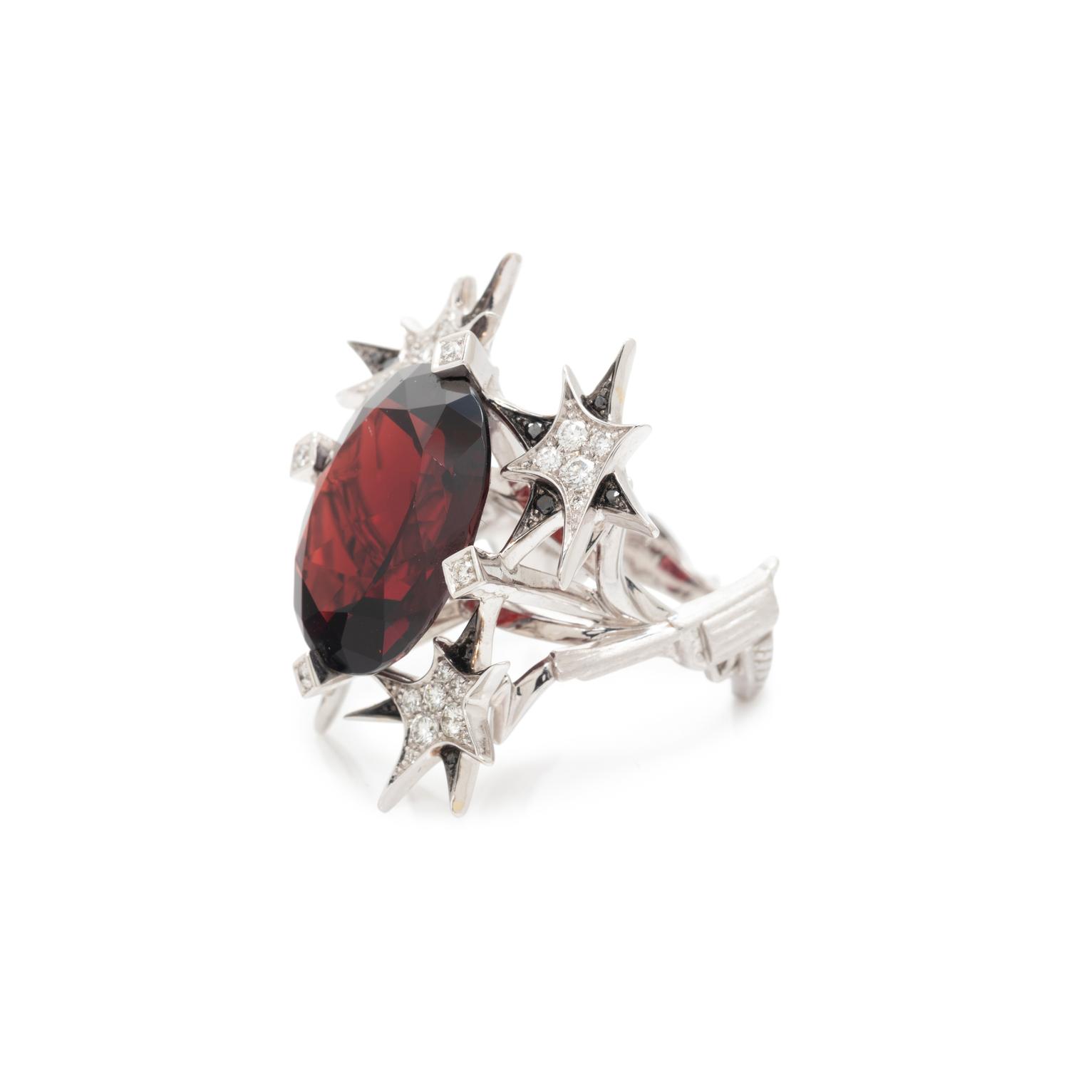 STEPHEN WEBSTER, GARNET, DIAMOND, AND BLACK DIAMOND 'PISTOL' RING