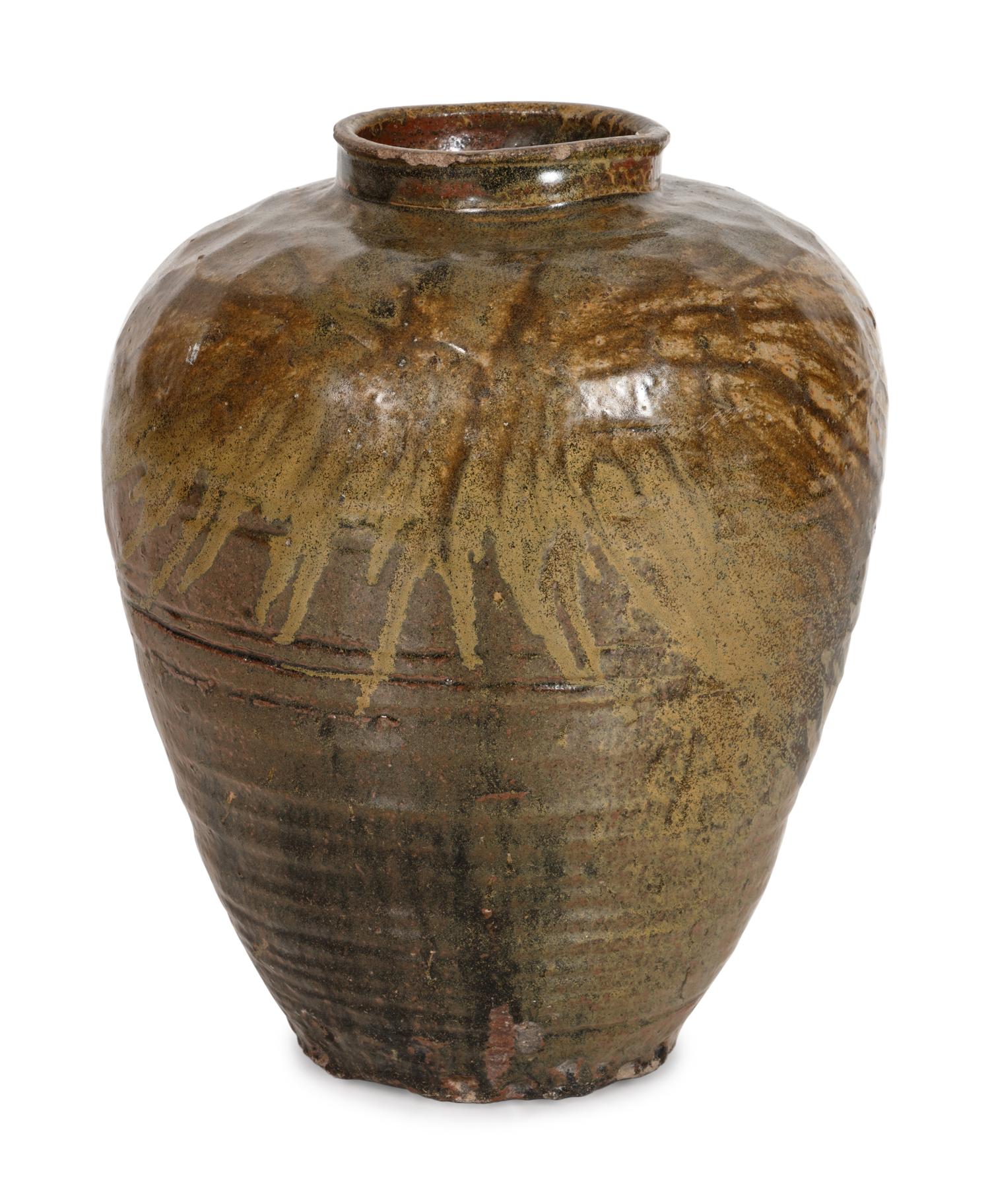 A Large Middle Eastern Glazed Terracotta Storage Jar