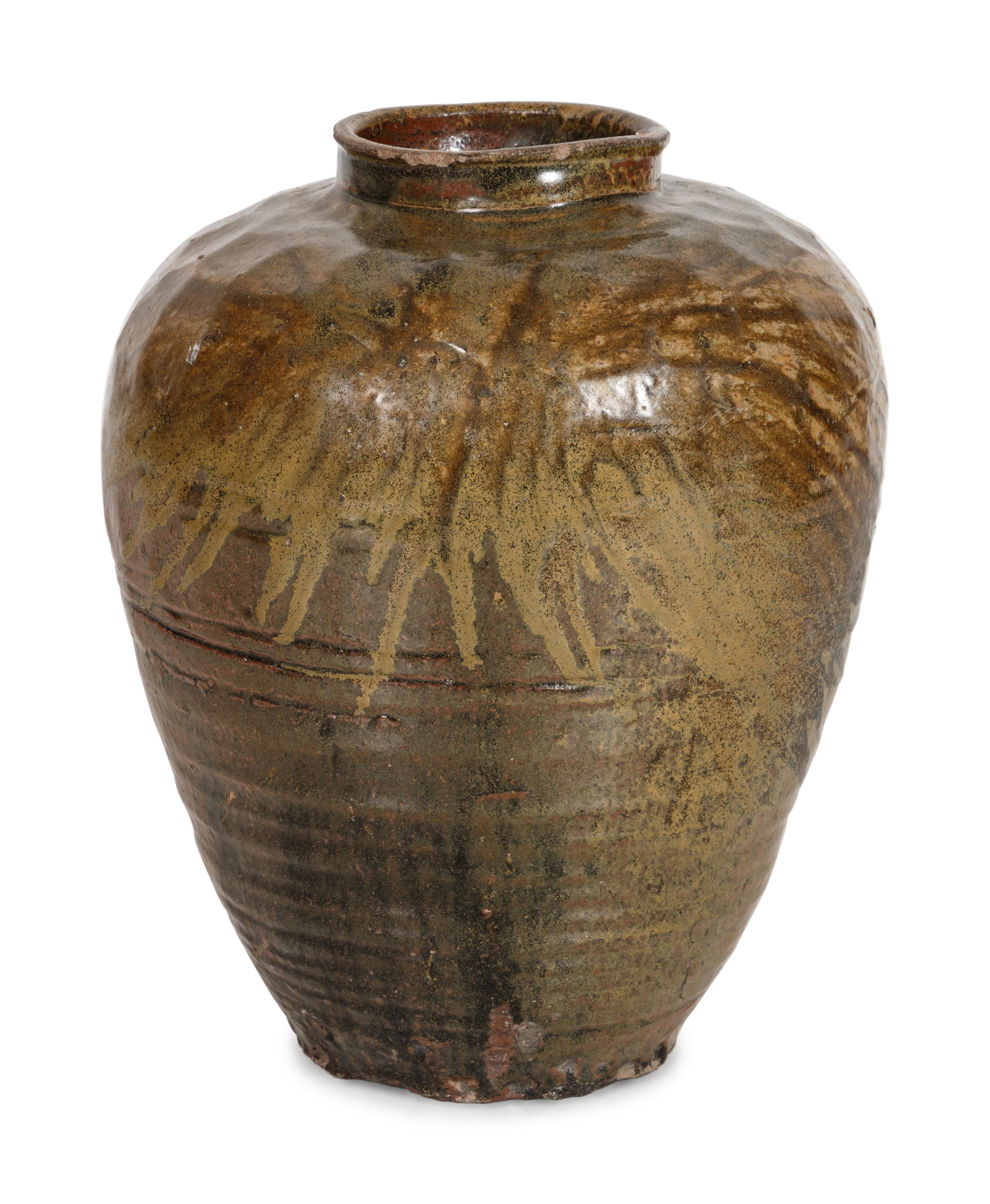 A Large Middle Eastern Glazed Terracotta Storage Jar