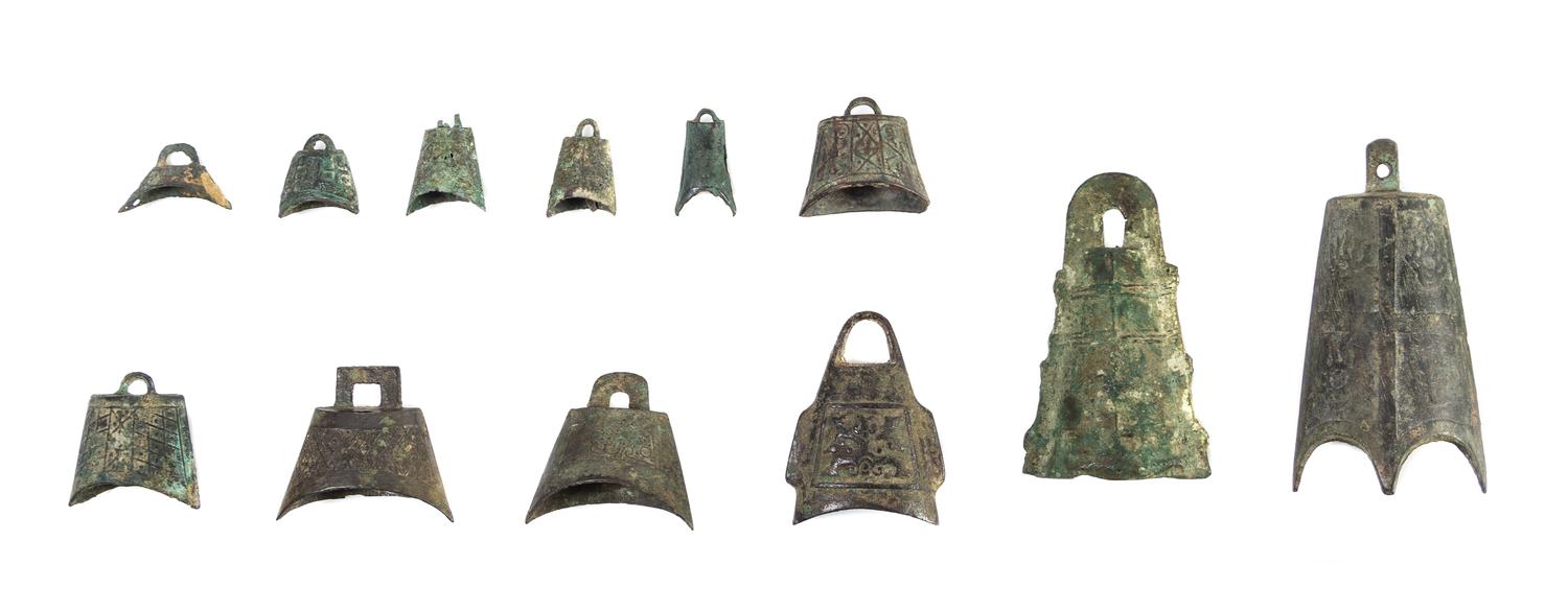 A Set of Twelve Chinese Bronze Bells HAN DYNASTY OR EARLIER Height of tallest 5 1/4 inches. — HAN DYNASTY OR EARLIER