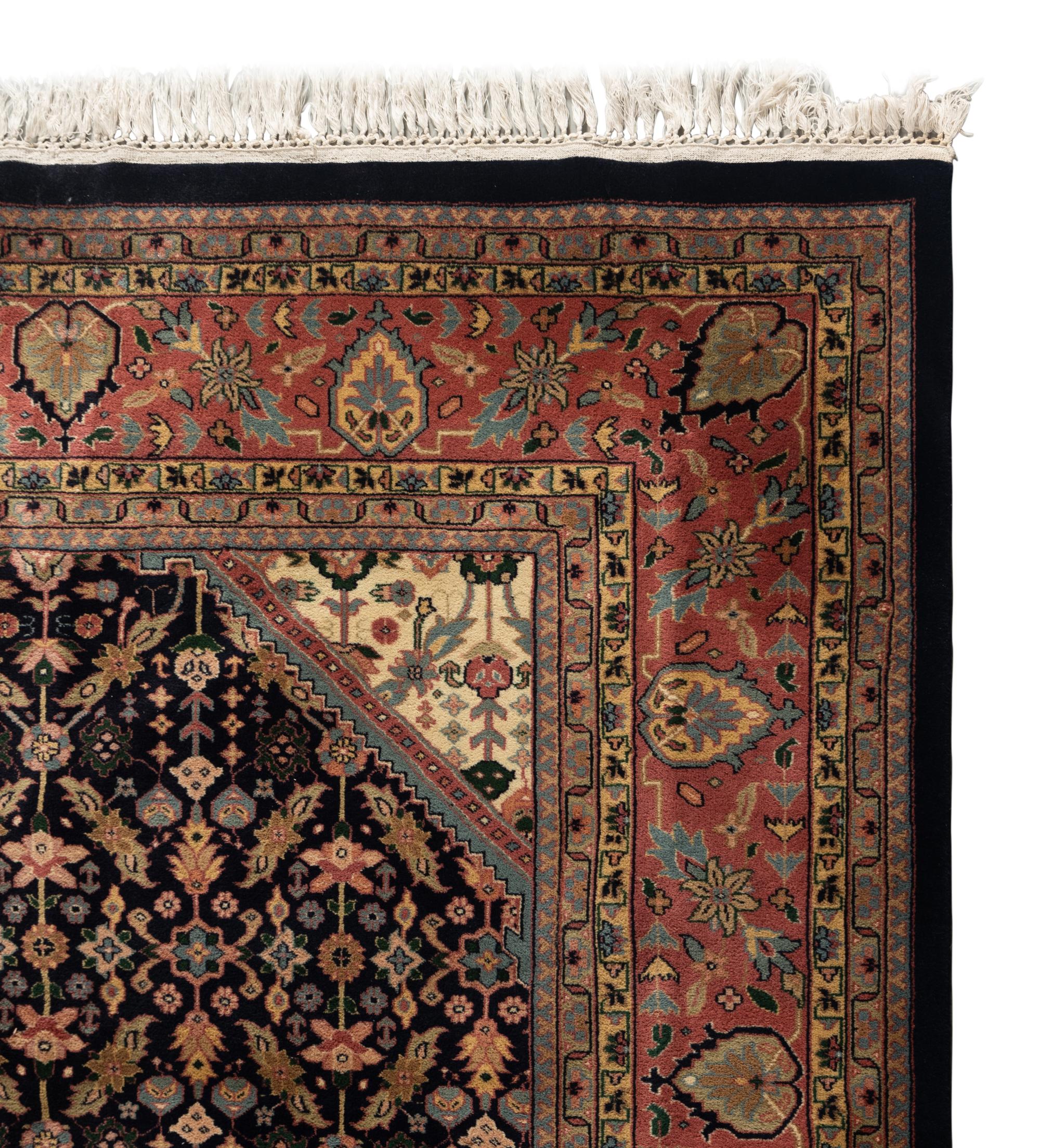An Indo Tabriz Wool Rug