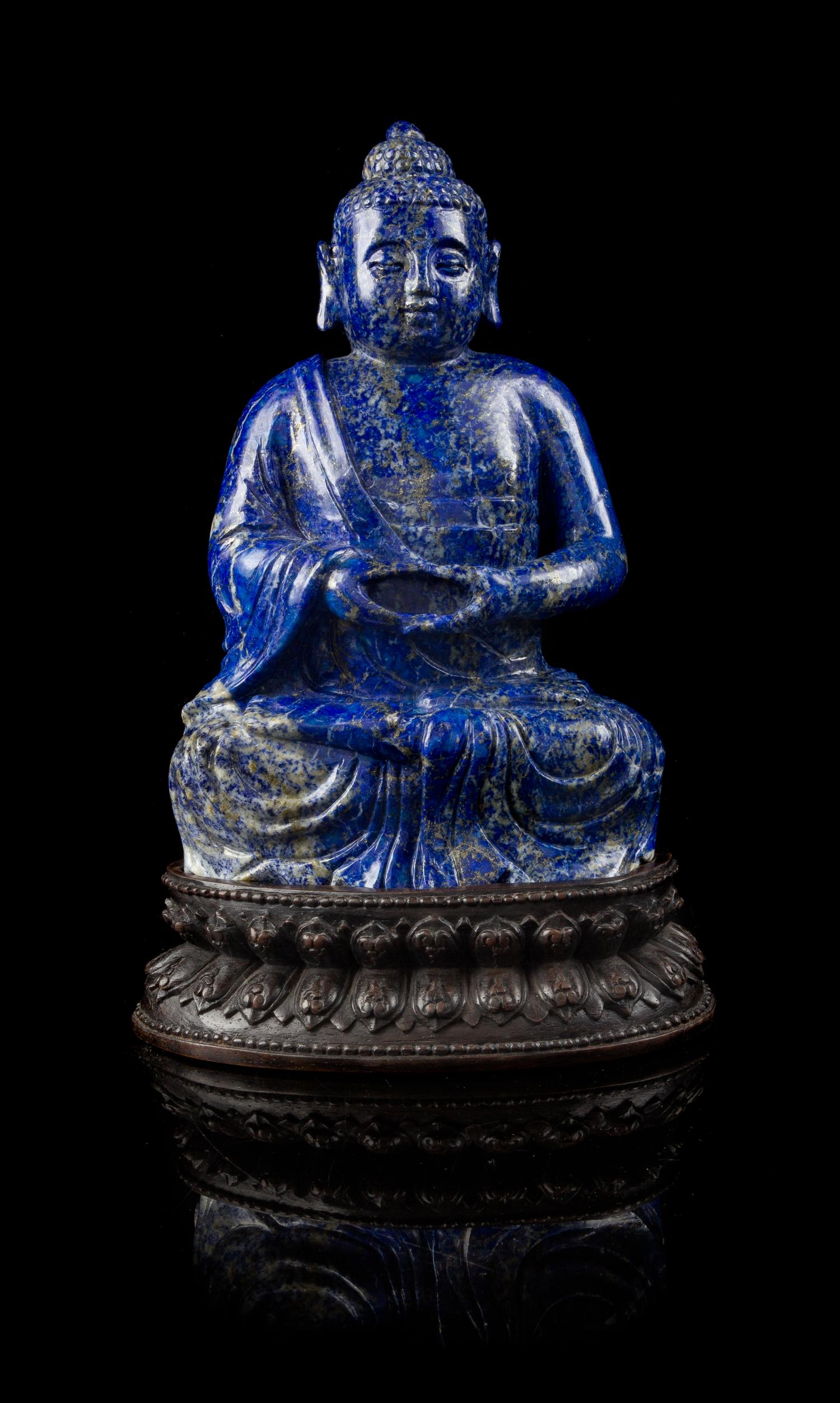 A Lapis Lazuli Figure of Buddha Height 8 1/2 inches.