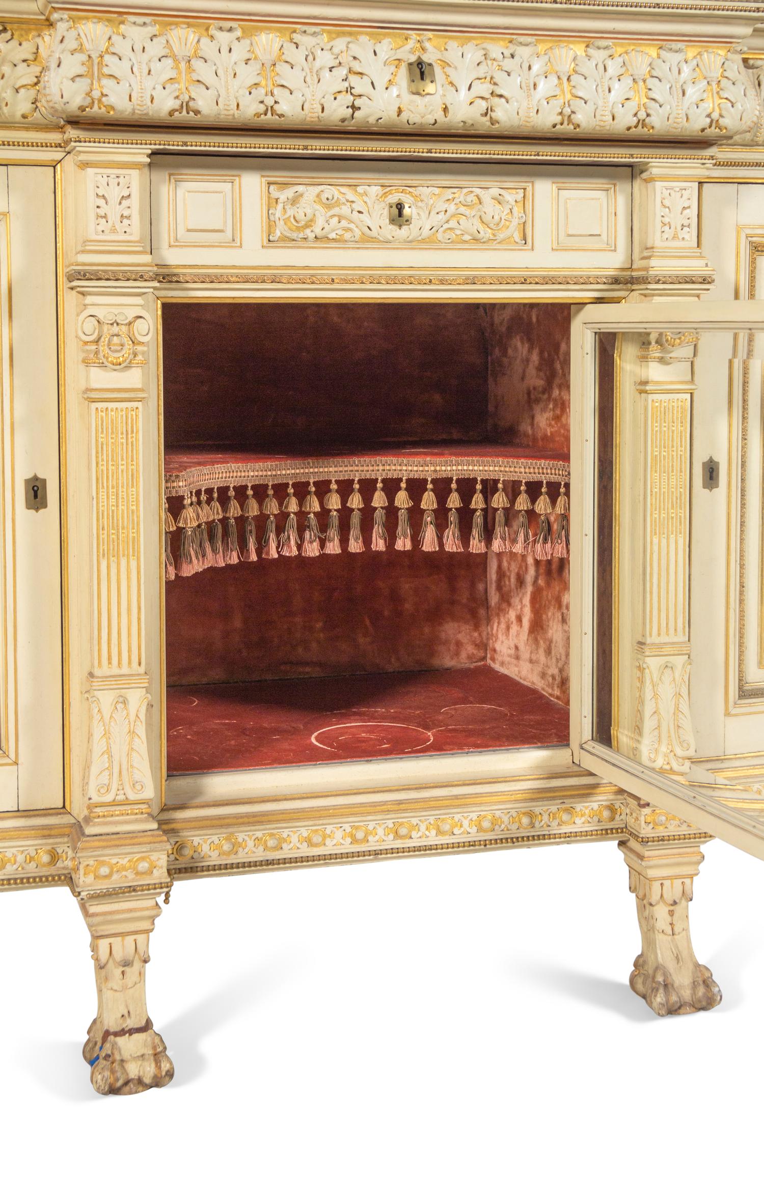 A Fine Renaissance Revival Parcel Gilt and Ivory-Painted Cabinet