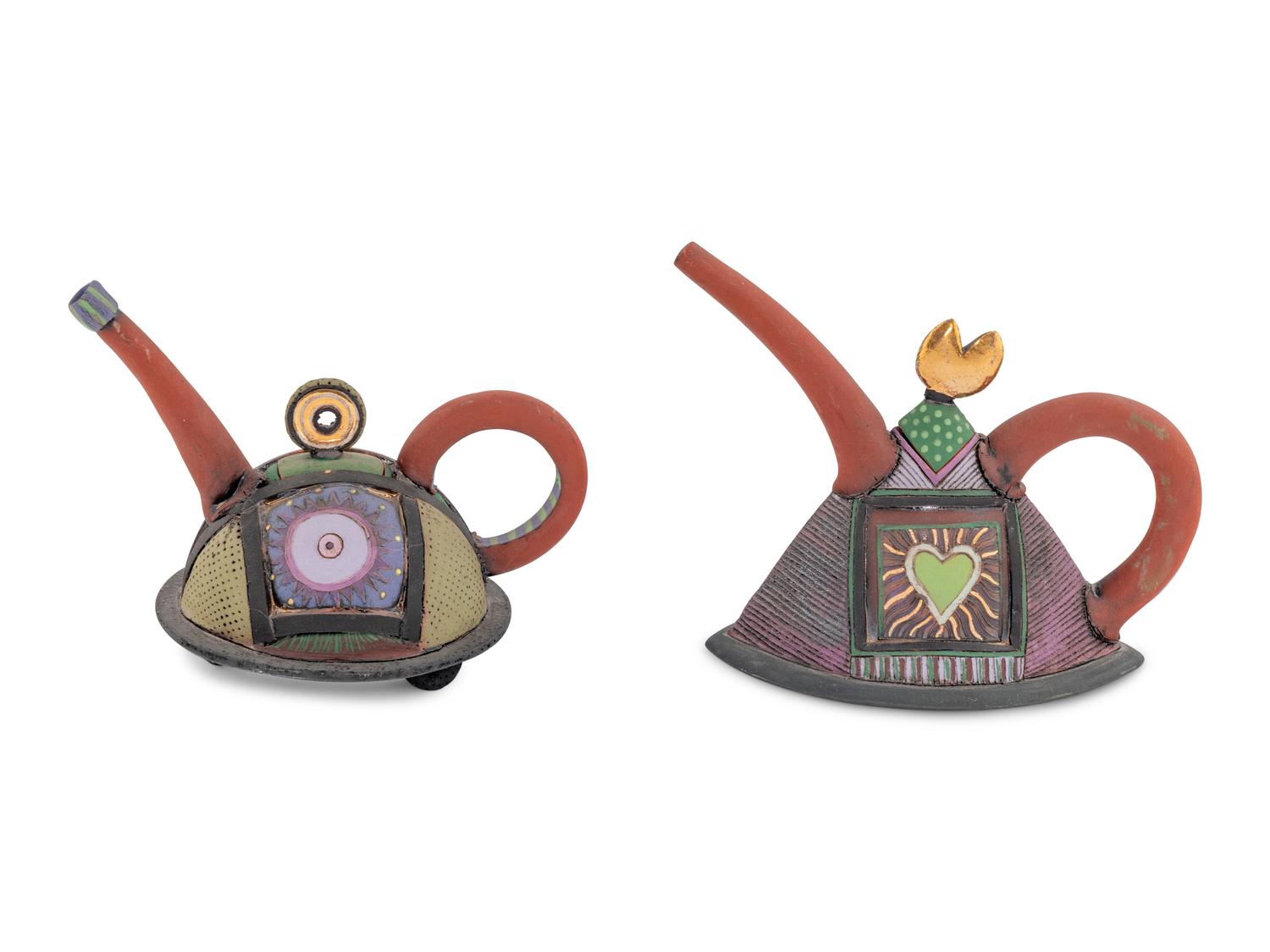 A Pair of Whimsical Ceramic Teapots