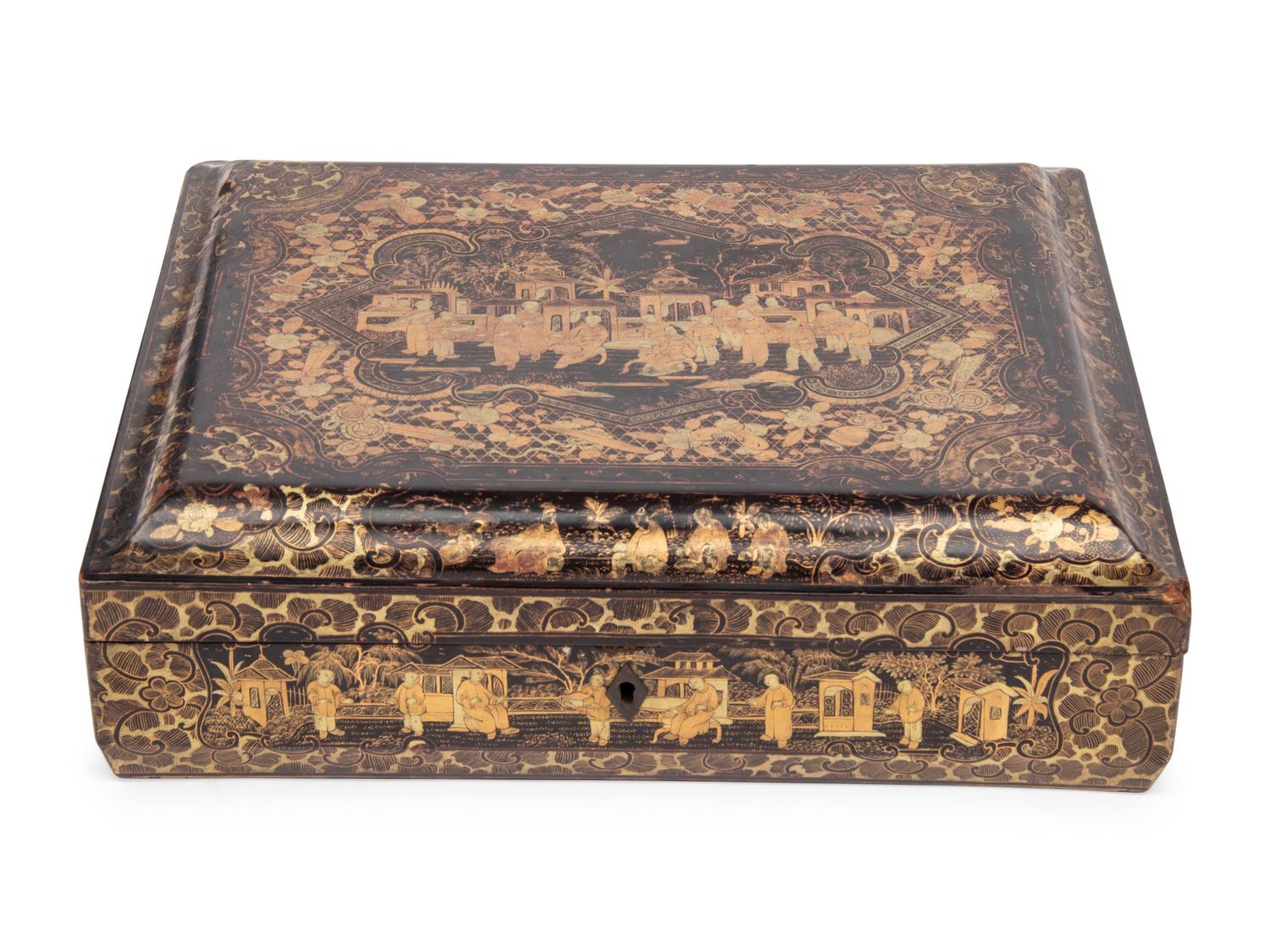A Chinese Export Black Lacquer and Parcel-Gilt Game Box