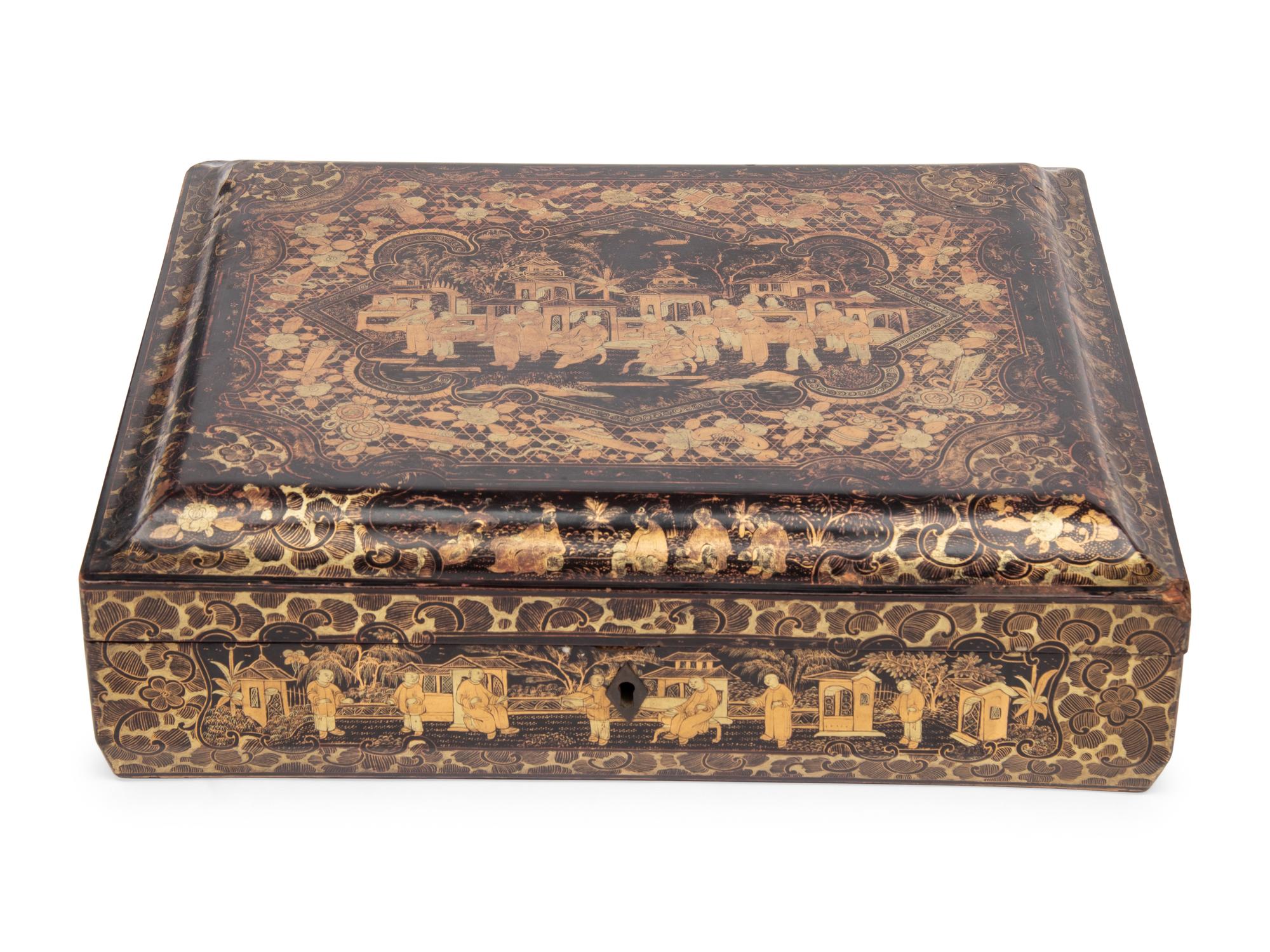 A Chinese Export Black Lacquer and Parcel-Gilt Game Box