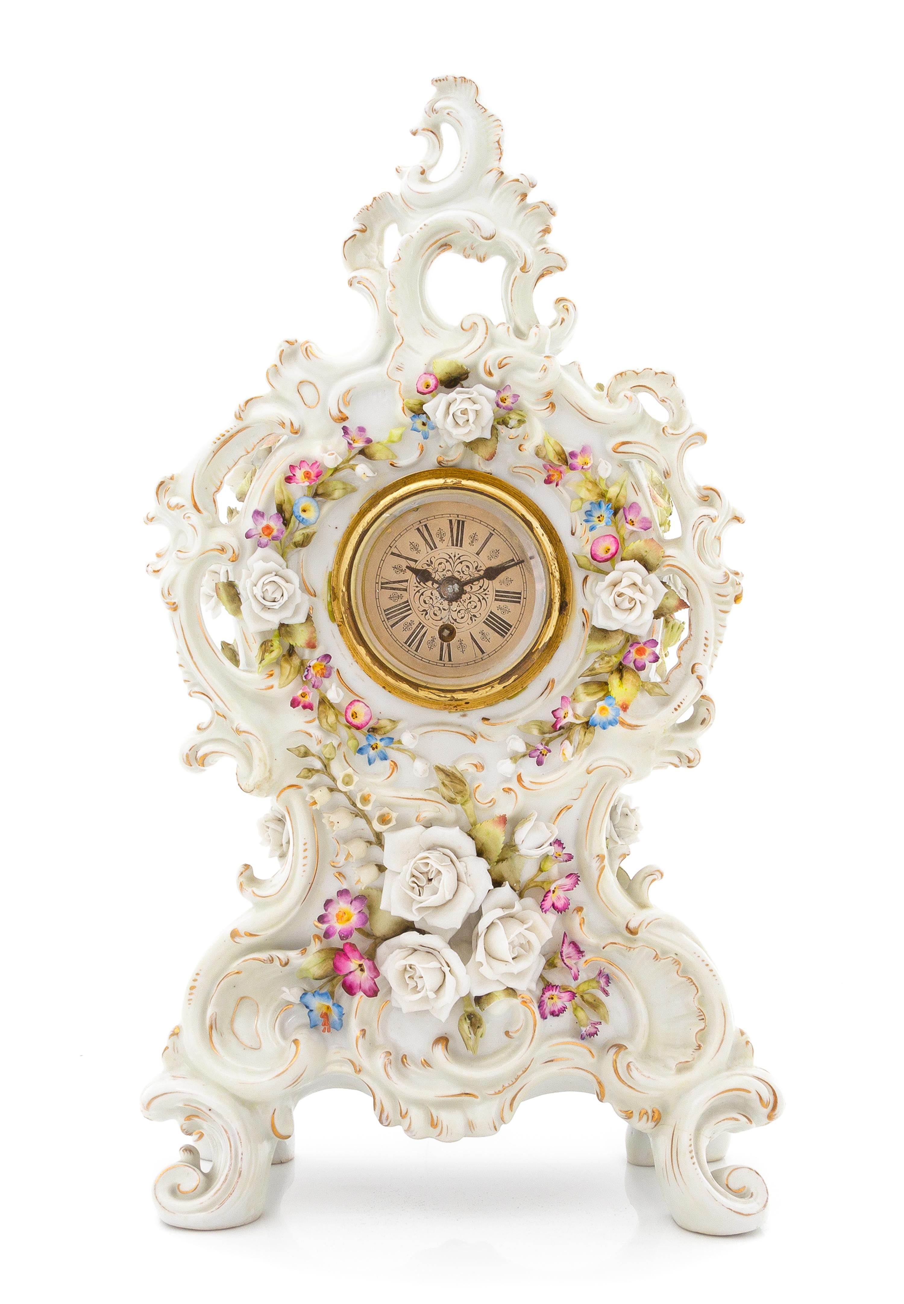 A Continental Porcelain Mantle Clock Height overall 14 3/8 inches. — 20TH CENTURY