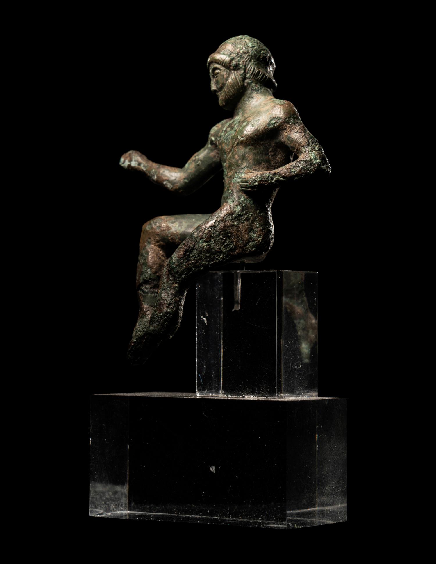 An Attic Bronze Figure of a Horseman