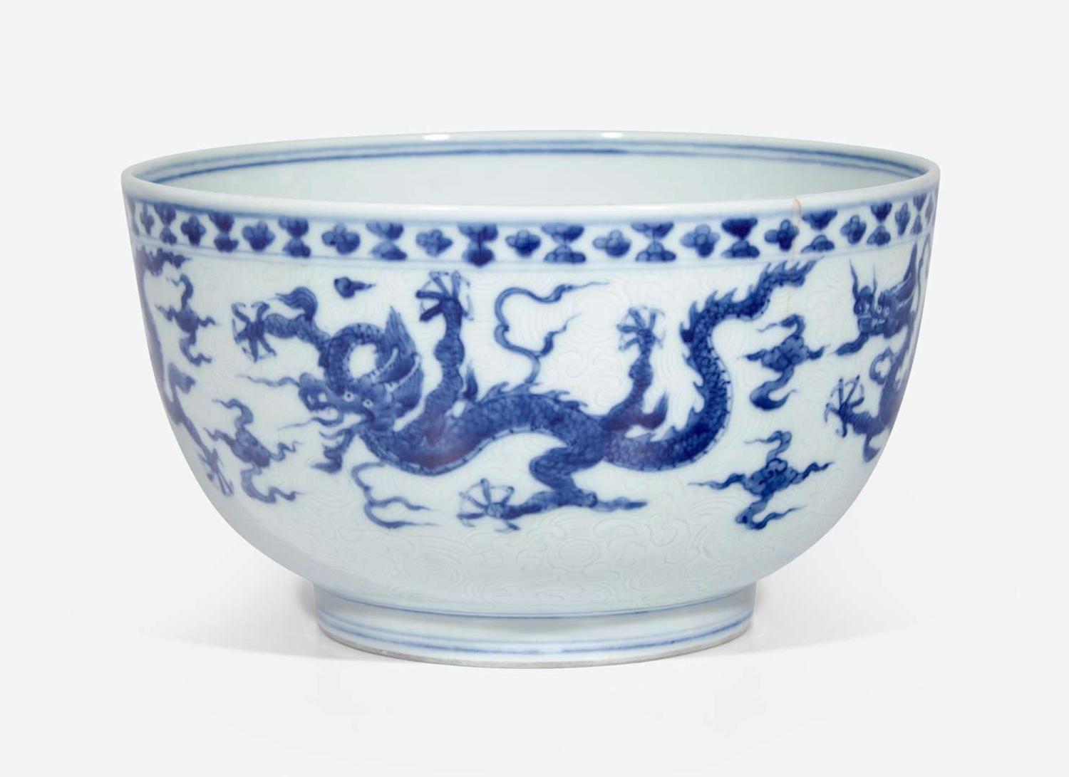 An unusual Chinese blue and white "Dragon" deep bowl, Zhengde mark, possibly 18th century 青花龍紋深腹盌 正德款 或十八世紀