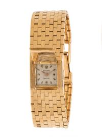 18K YELLOW GOLD SURPRISE WRISTWATCH