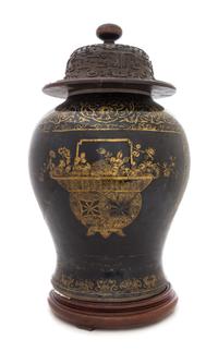 A Gilt Decorated Mirror Black Glazed Porcelain Baluster Jar Height 12 inches.