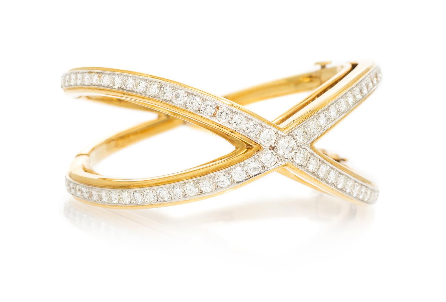 A Yellow Gold and Diamond Criss-Cross Bangle Bracelet, 46.60 dwts.