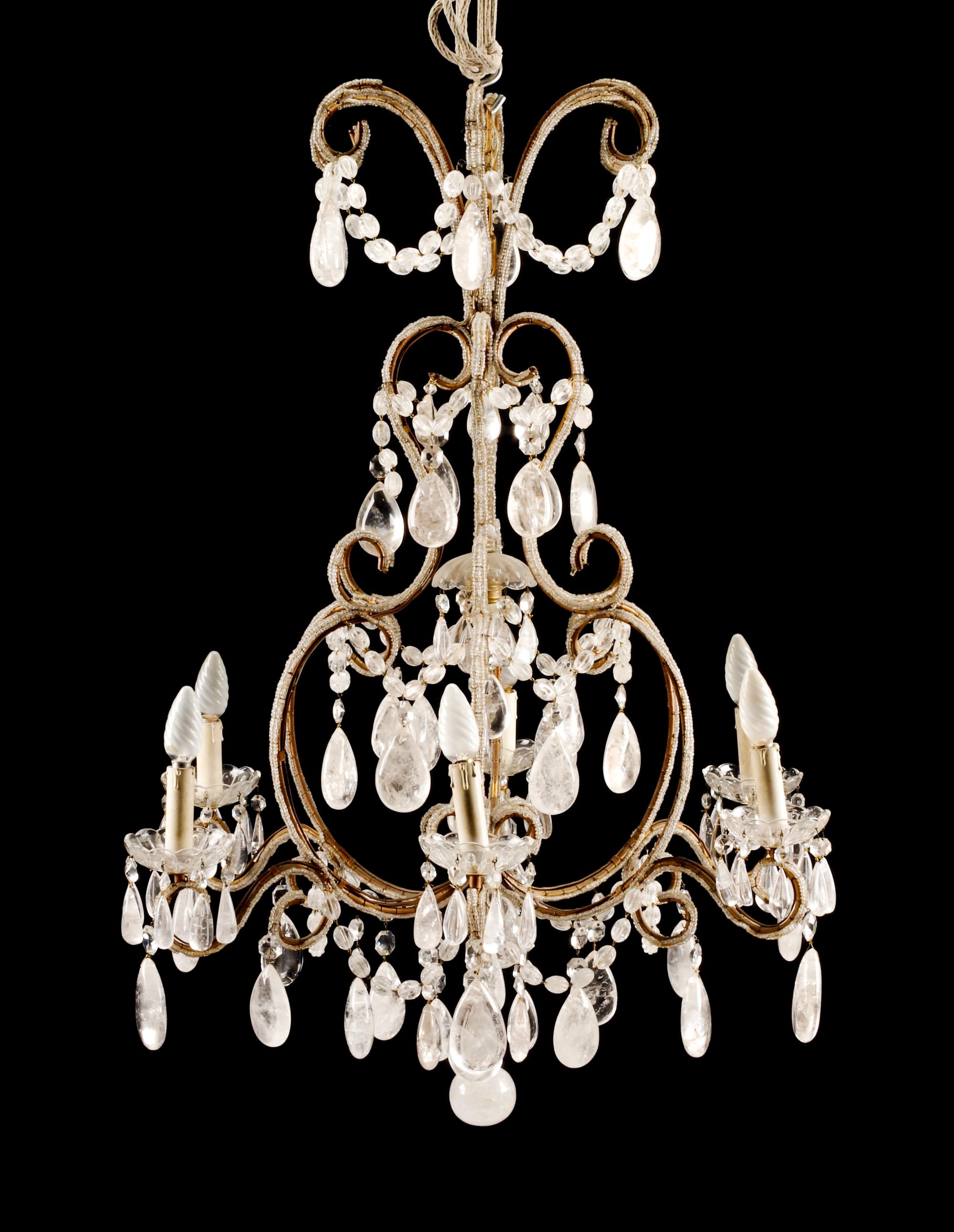 An Italian Beaded and Rock Crystal Mounted Chandelier Height 38 x diameter 30 inches.