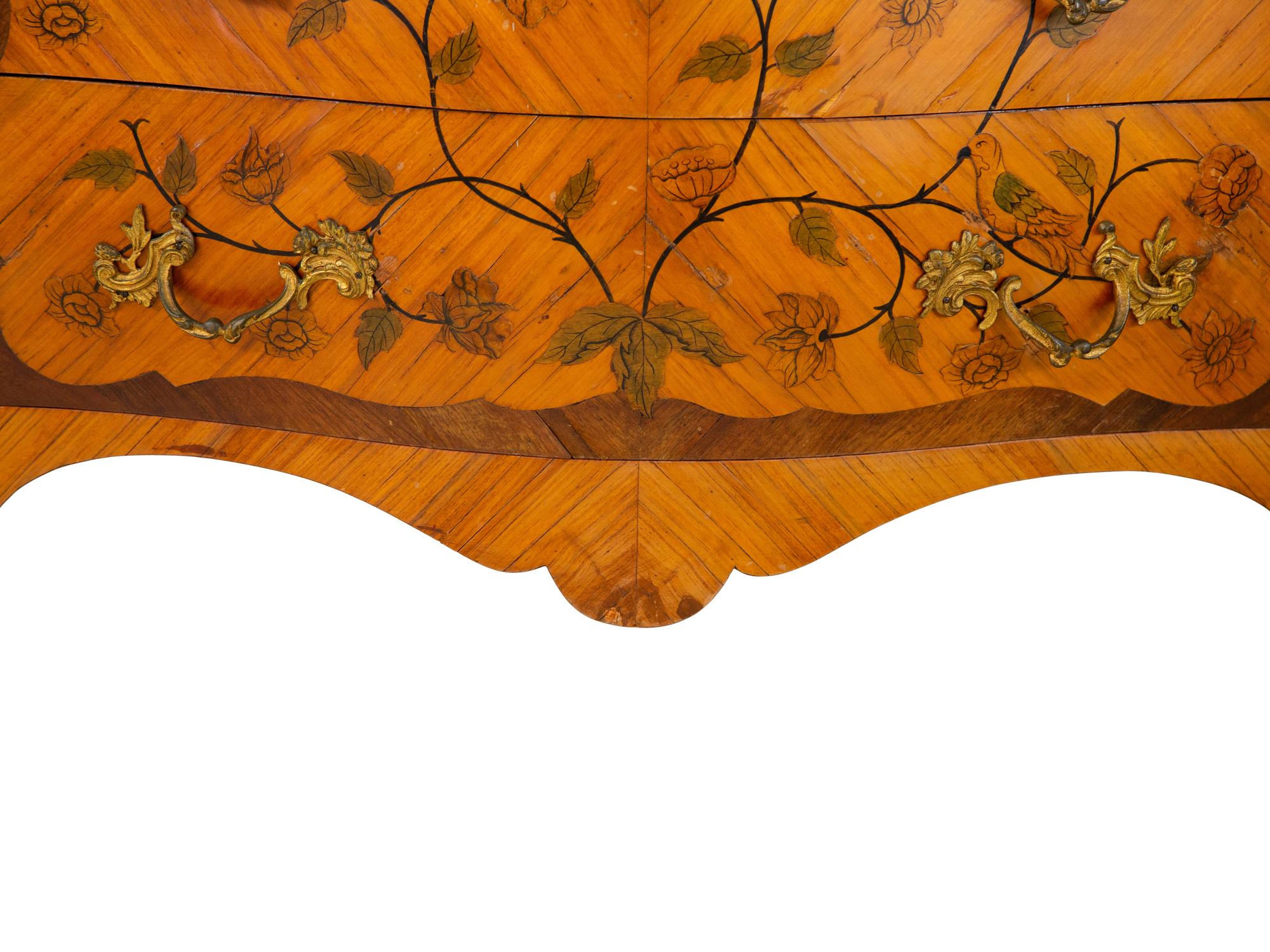 A Louis XV Style Gilt Bronze Mounted Marquetry Marble-Top Commode