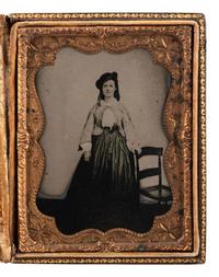 [CIVIL WAR]. Quarter plate tintype of a young woman, possibly a vivandiere, acquired in Dublin, Virginia.
